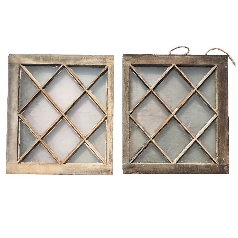 Pair of beautiful salvaged windows from a historic Oklahoma City mansion. This mansion was built close to Oklahoma's statehood. Each window has been removed from the property with care. The inside of each window shows the black soot that accumulated