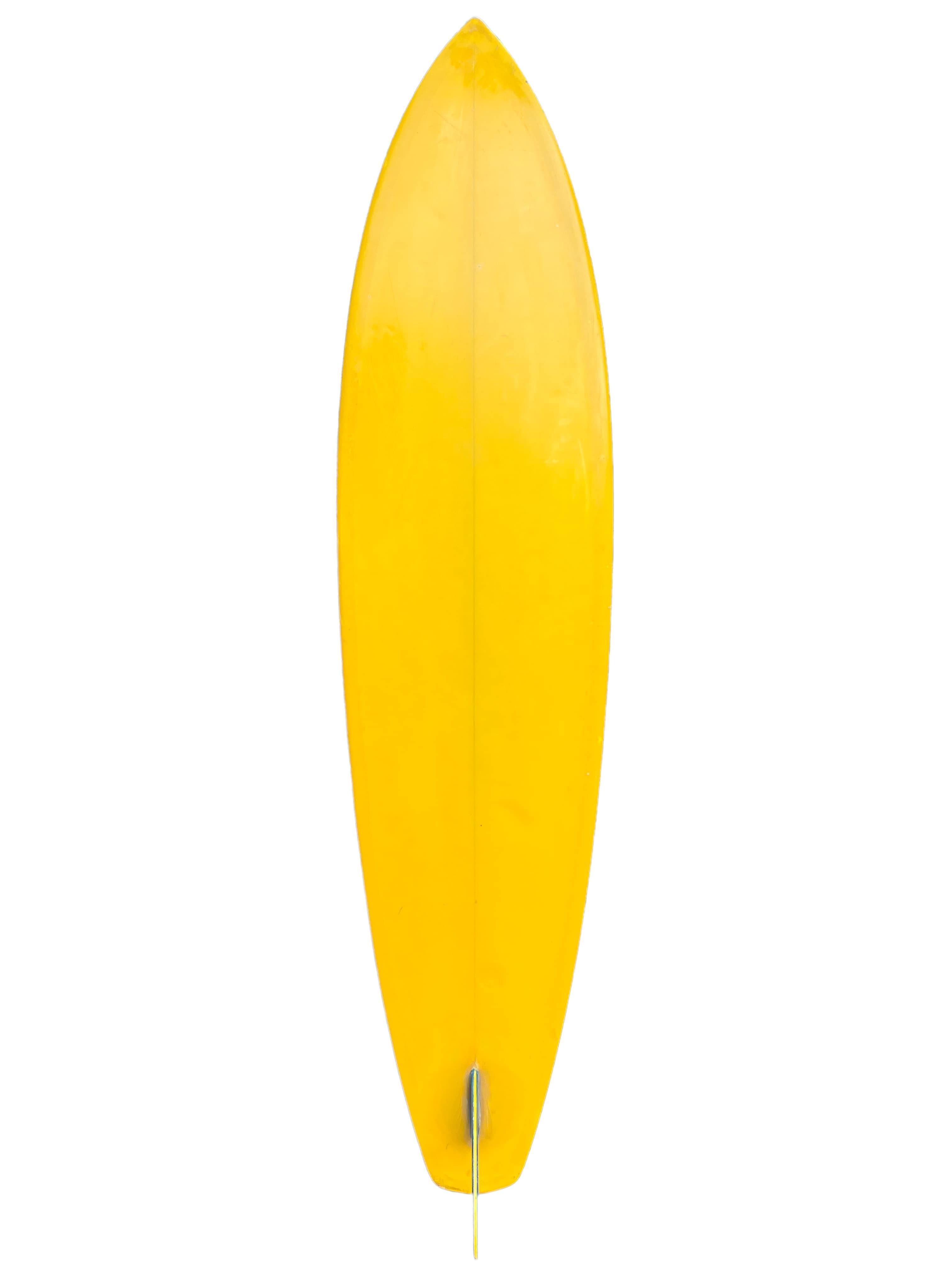 Historically Significant early Lightning Bolt surfboard hand shaped in 1972 by Gerry Lopez. Beautiful banana yellow with sky blue Lightning Bolt design complimented by a matching blue/yellow glassed on single fin. One of the earliest Lightning Bolt