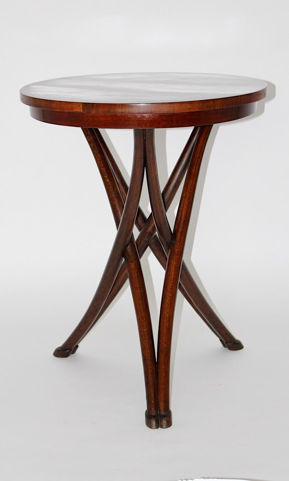 Historicism vintage side table from bentwood and beech in wonderful warm walnut stained color tone model No. 13 designed by August Thonet manufactured by Gebrüder Thonet, circa 1880 Vienna.
A very rare vintage side table model no 13 ( 9313 ) from