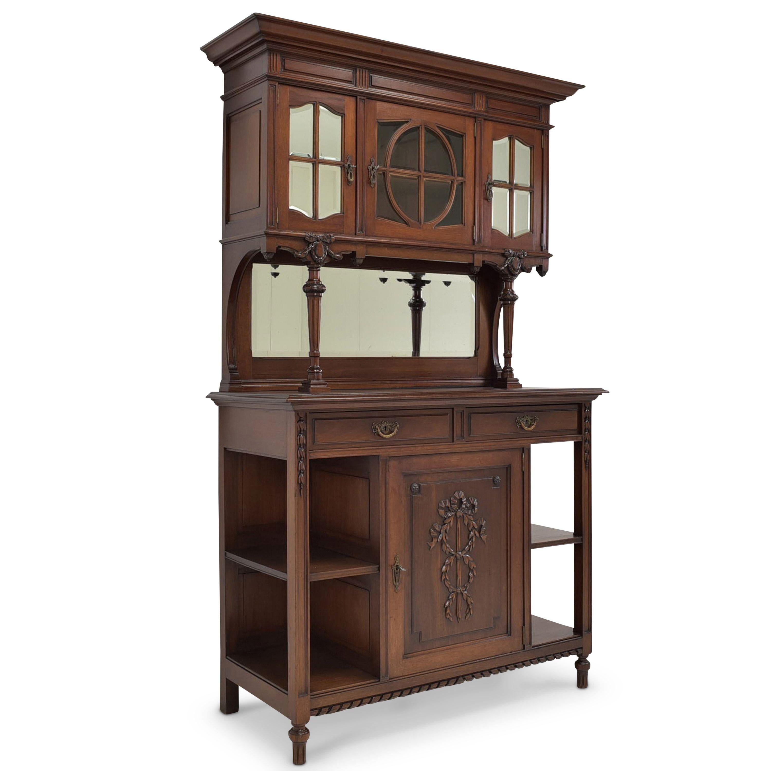 Buffet cabinet restored historicism / Louis XVI around 1910 solid mahogany

Features:
Single-door base with open sides and two drawers
Three-door essay on columns set inwards
Very high quality processing
Drawers pronged
Original