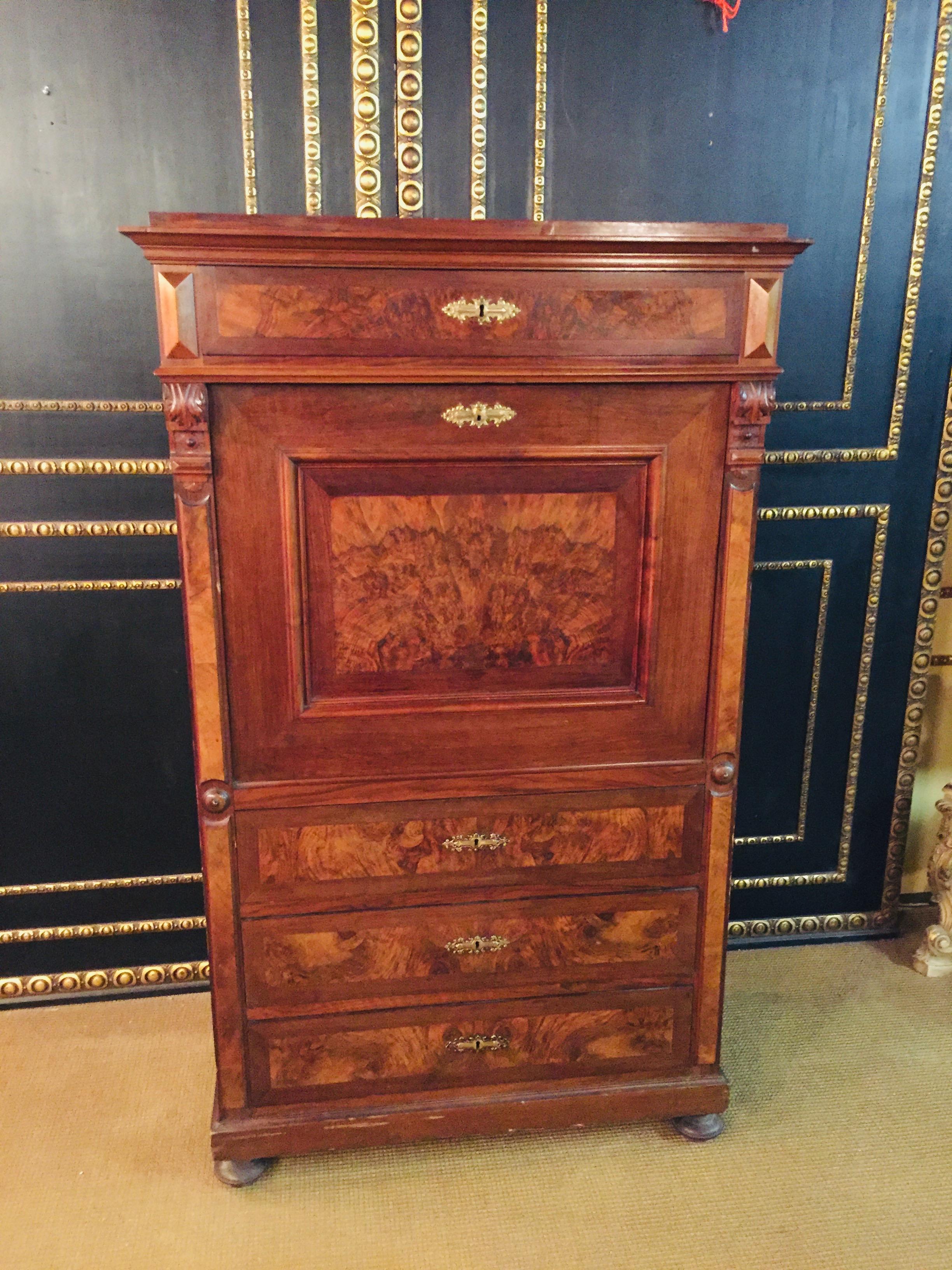 Beautiful secretary original from the Historicism Period 1880 walnut
a flap to open
inside are small drawers
the plate is there for writing. Above it 1 drawer, below again 3 drawers.
There are some holes from the old woodworm on the side but are