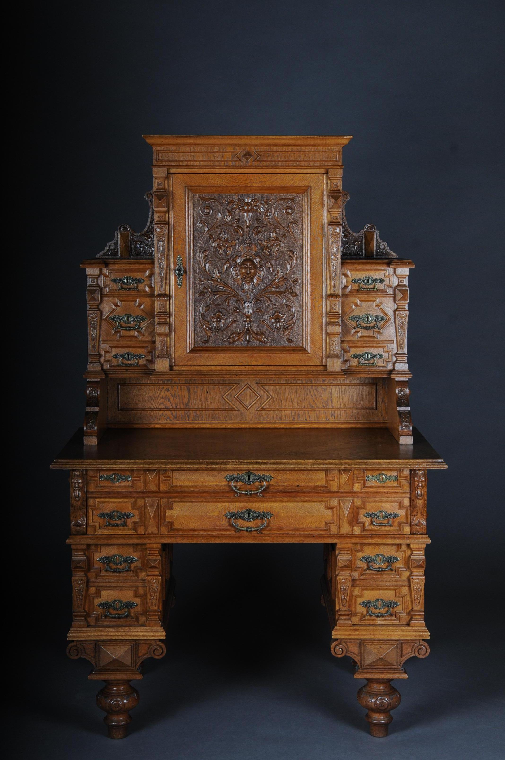 Historism essay desk / secretary circa 1870 light oak.

Solid wood body, oak partially veneered. Richly carved structure and substructure.
With various drawers. A large single-door storage space in the middle. Wide writing surface.
Very fine and