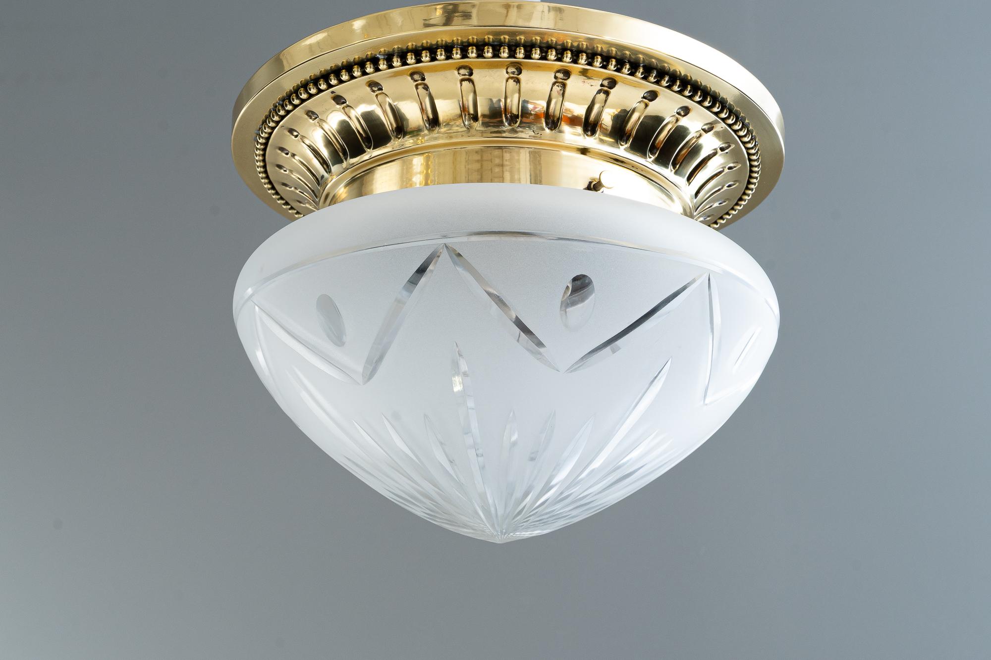 Historistic ceiling lamp with original cut glass vienna around 1890s
Brass polished and stove enameled
Original cut glass