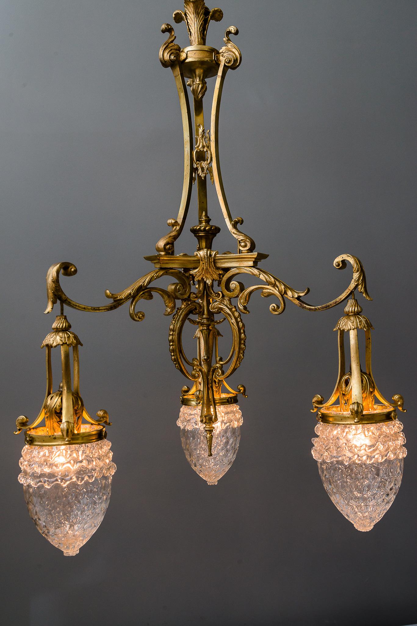 Late 19th Century Historistic Chandelier Gilded with Original Glasses, circa 1890s