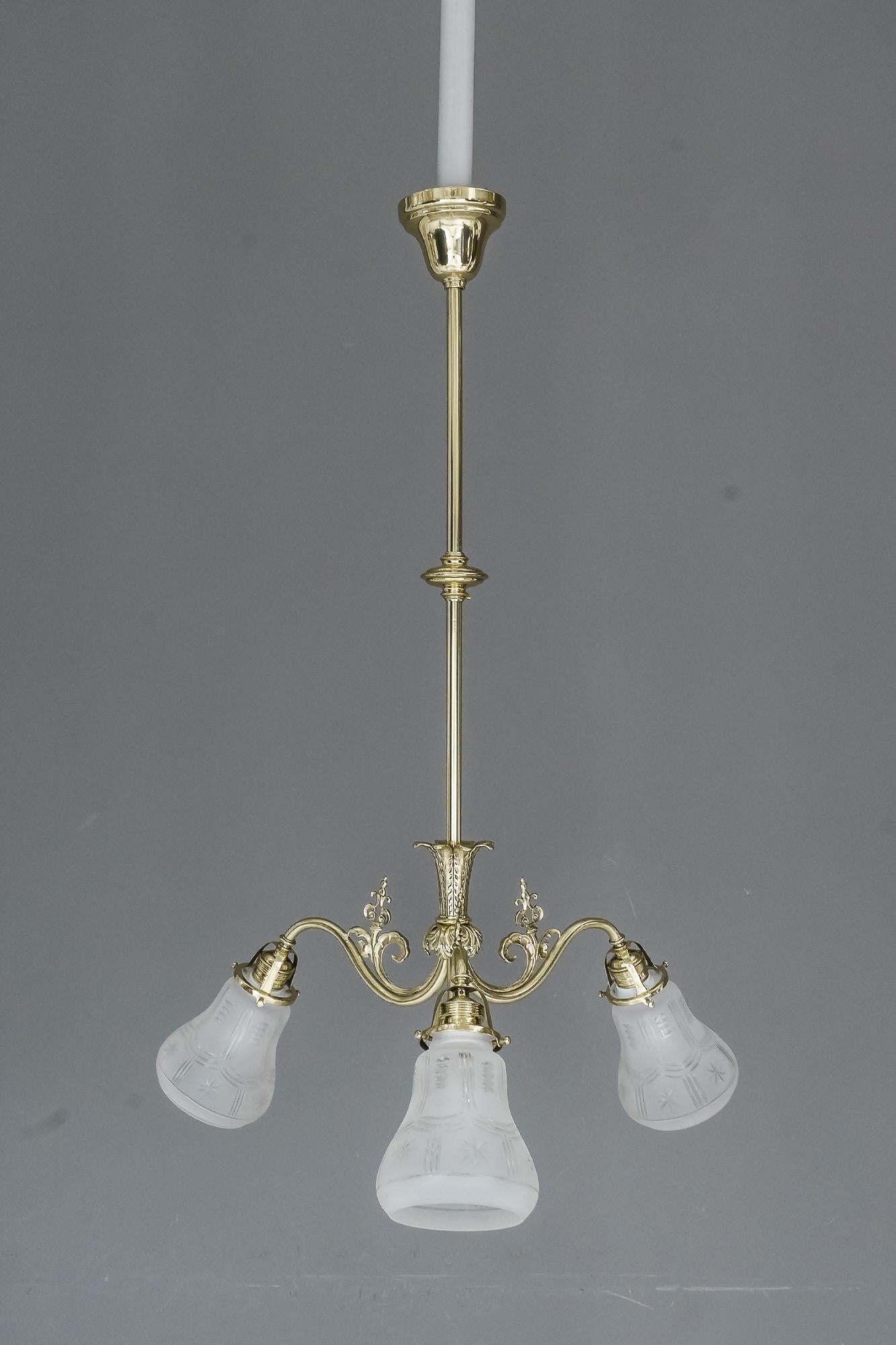 Historistic chandelier, Vienna, circa 1890s.
Brass polished and stove enameled
Original glass shades.