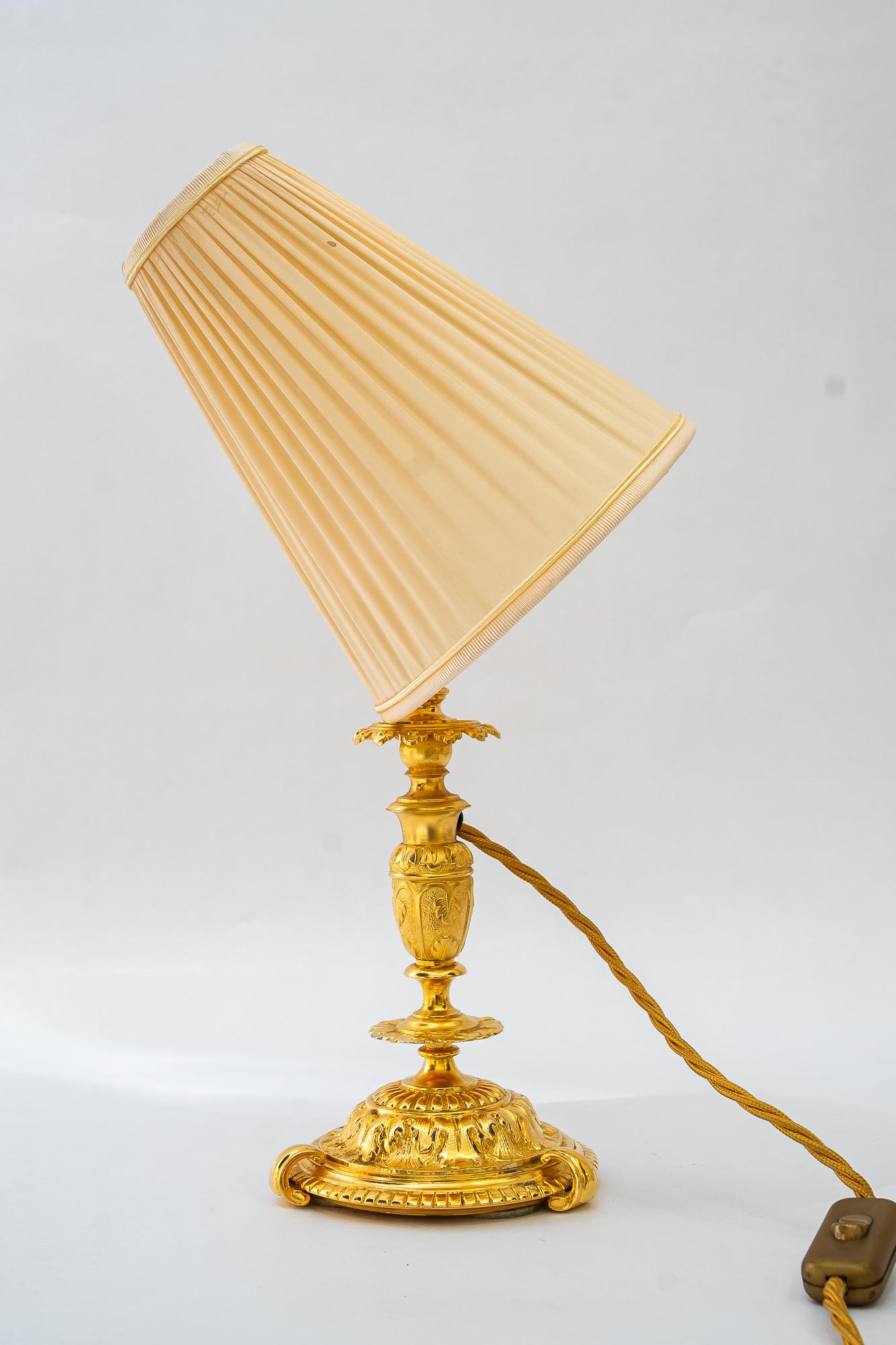 Historistic fire gilted table lamp with fabric shade vienna around 1890s For Sale 2