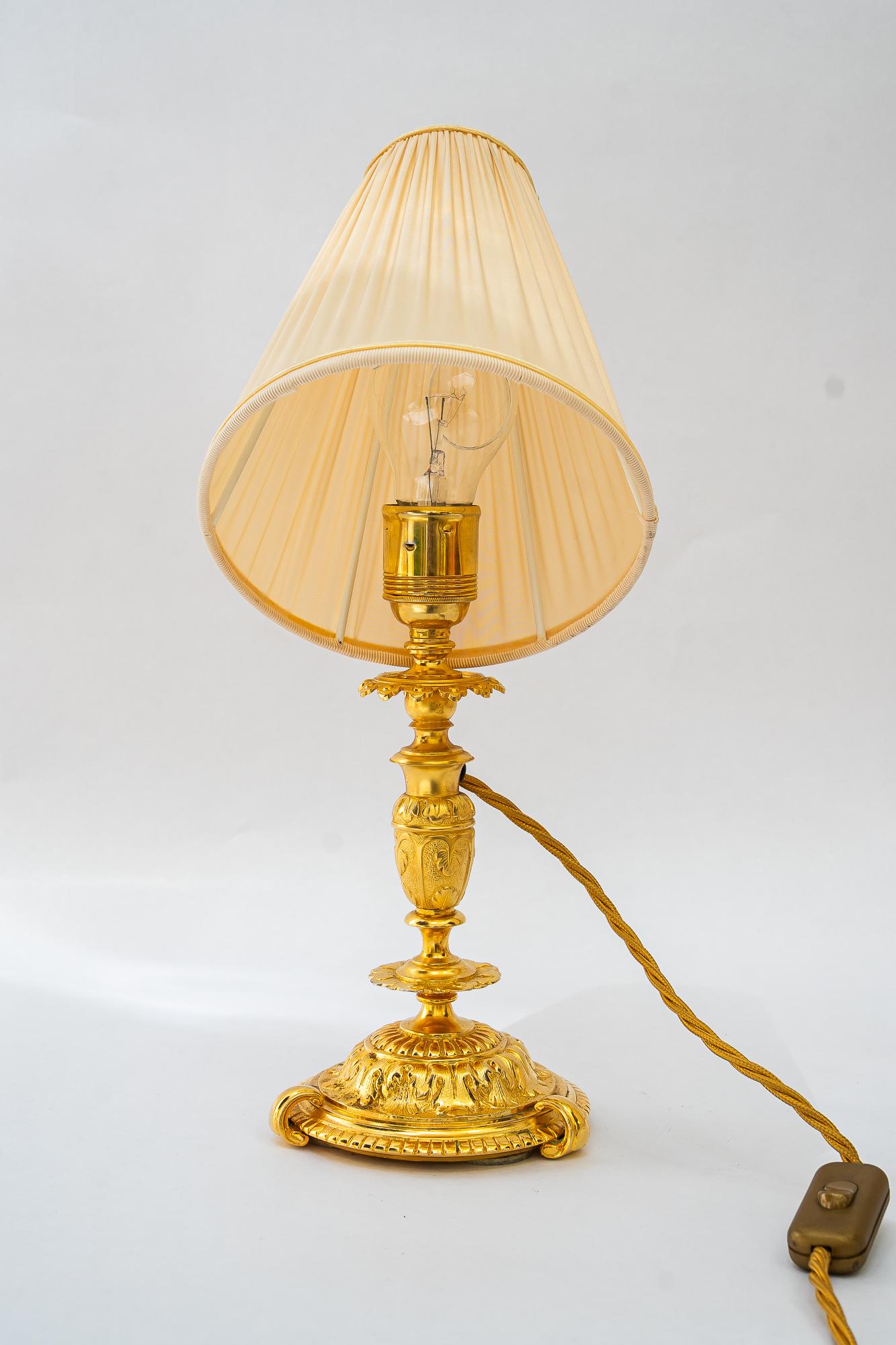 Historistic fire gilted table lamp with fabric shade vienna around 1890s For Sale 3