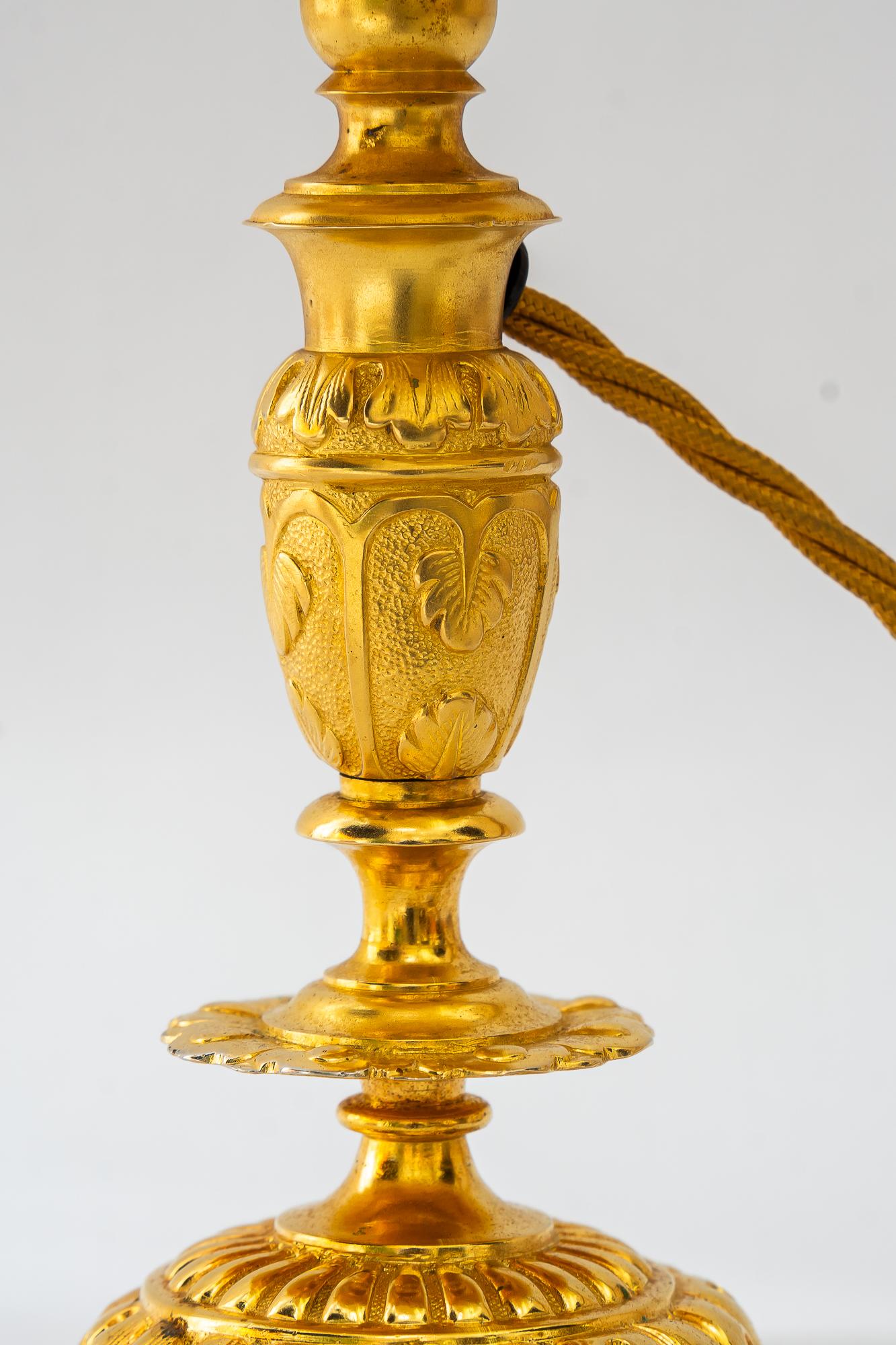Austrian Historistic fire gilted table lamp with fabric shade vienna around 1890s For Sale