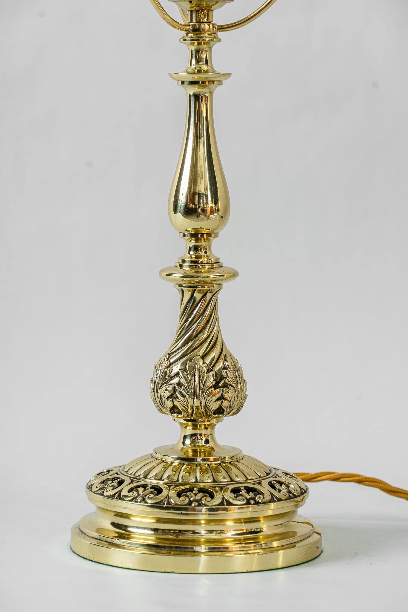 Historistic table lamp with cut glass shade around 1890s
Polished and stove enameled
Original glass shade