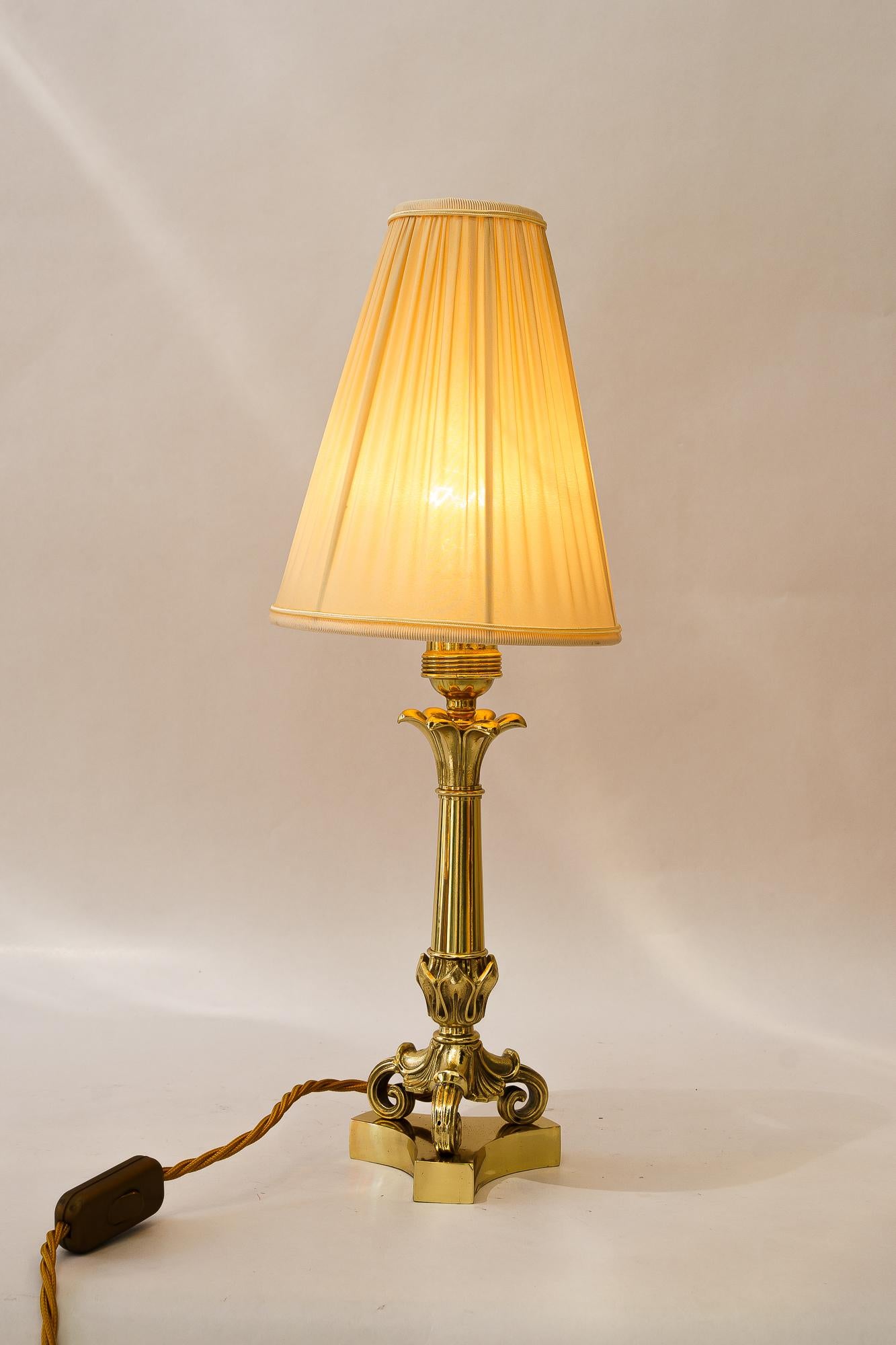 Historistic Table lamp with fabric shade vienna around 1890s
Brass polished and stove enameled
The fabric shade is replaced ( new )
