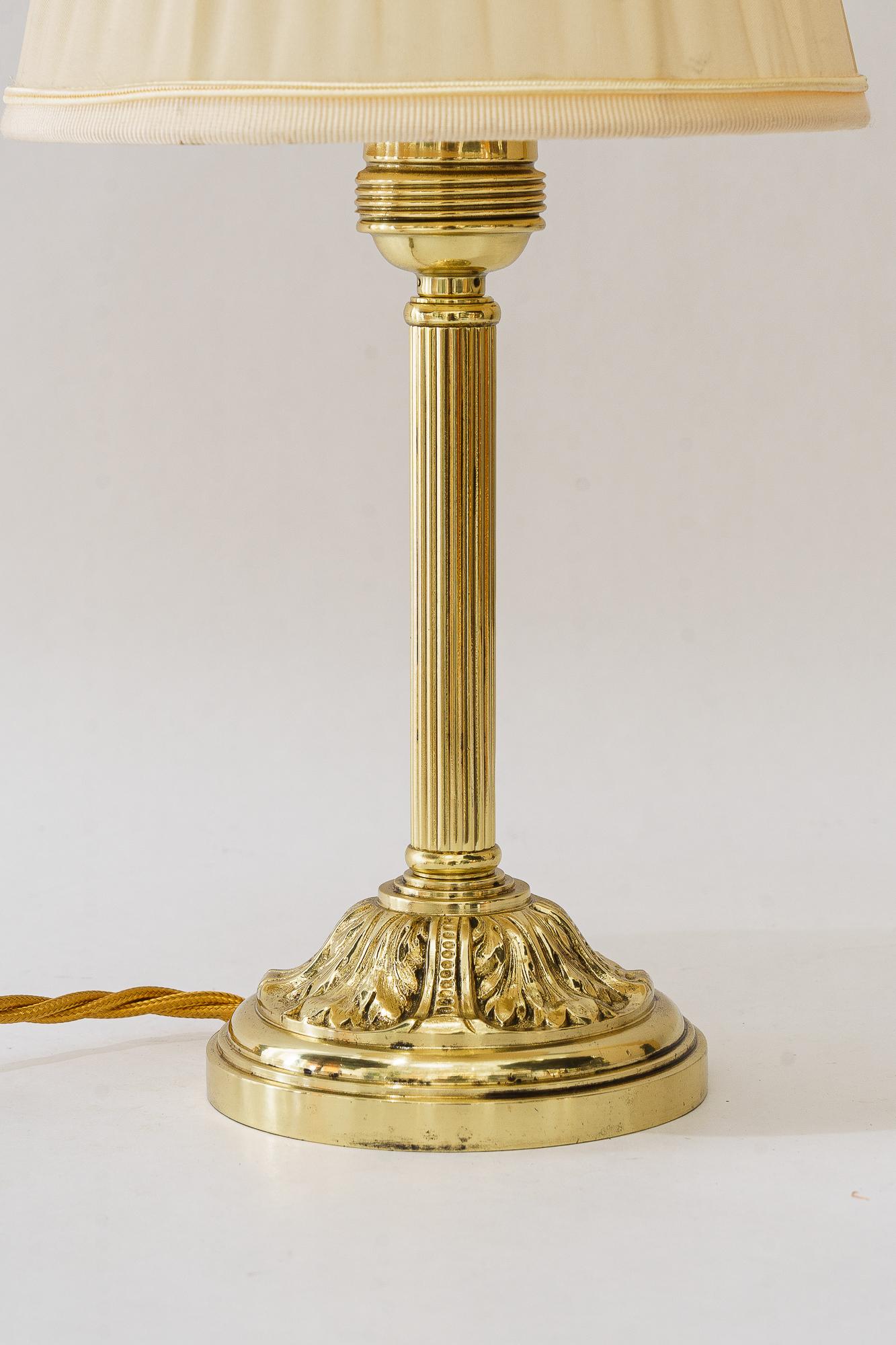 Historistic table lamp with fabric shade vienna around 1890s
Brass polished and stove enameled
The fabric shade is replaced ( new )