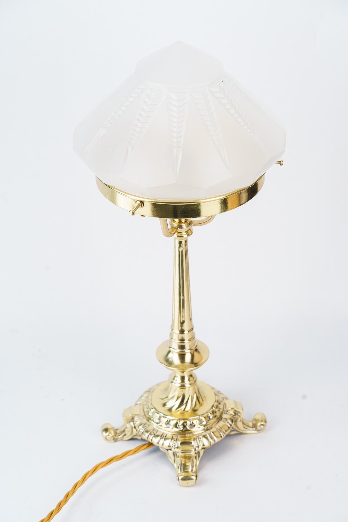 Historistic Table lamp with original antique glass shade vienna around 1890s
Polished and stove enameled
Original antique glass shade