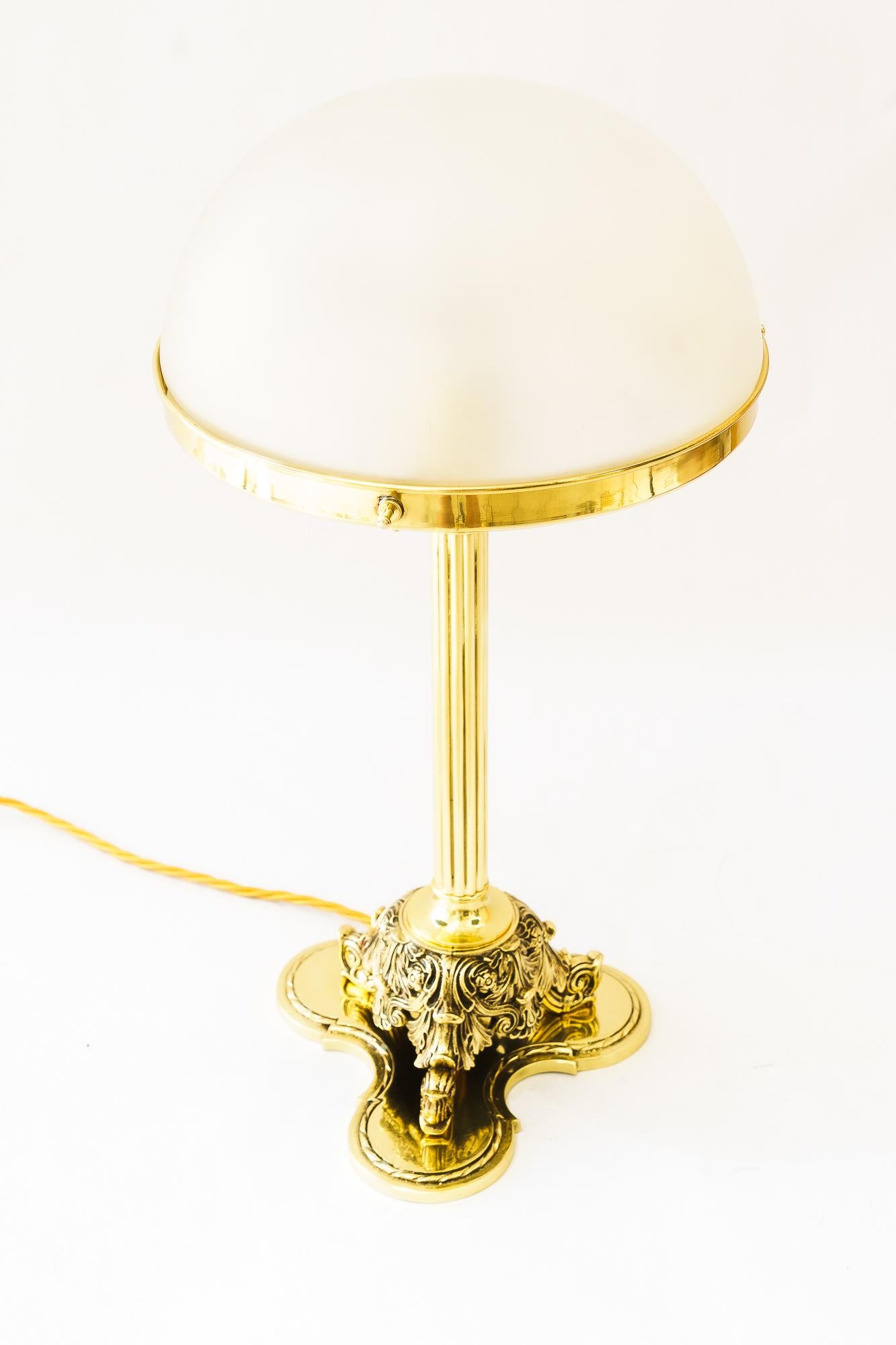Historistic Table lamp with original antique glass shade vienna around 1890s
Brass polished and stove enameled
Original antique glass shade