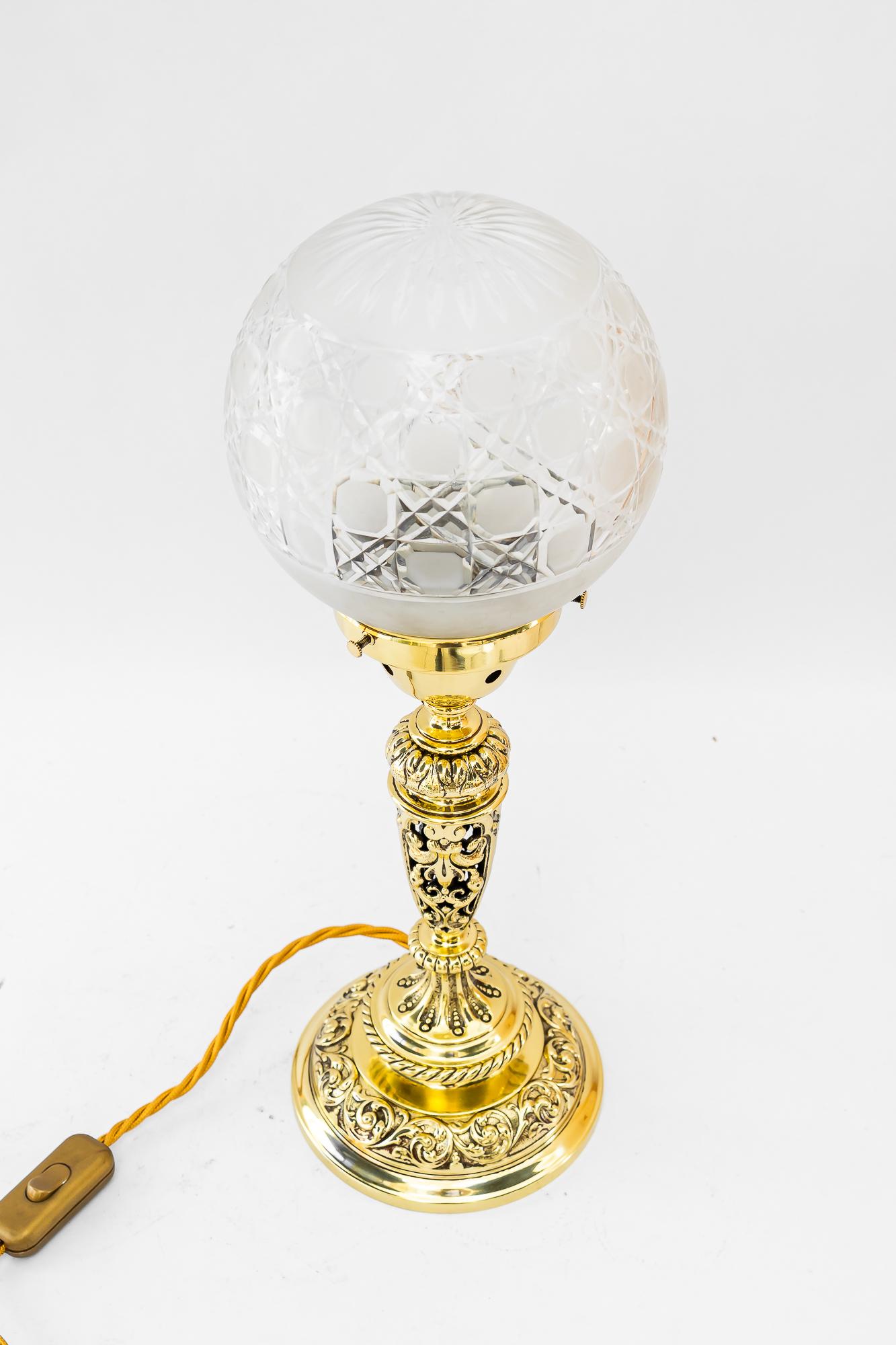 Historistic table lamp with original cut glass shade vienna around 1890s
Brass polished and stove enameled
Original old cut glass shade