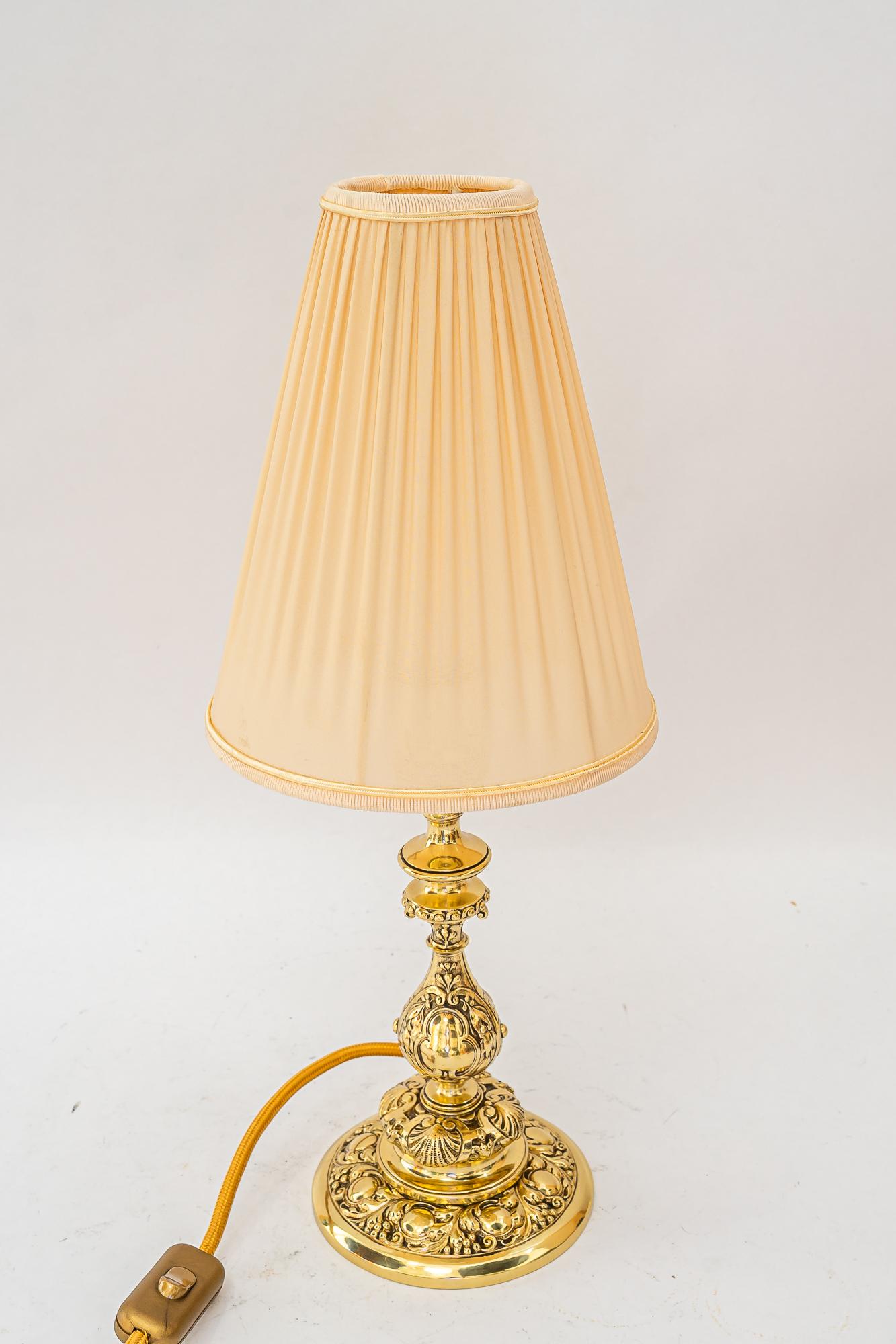 Historistic table lamp with original cut glass shade vienna around 1890s
Brass polished and stove enameled
The fabric shade is replaced ( new )