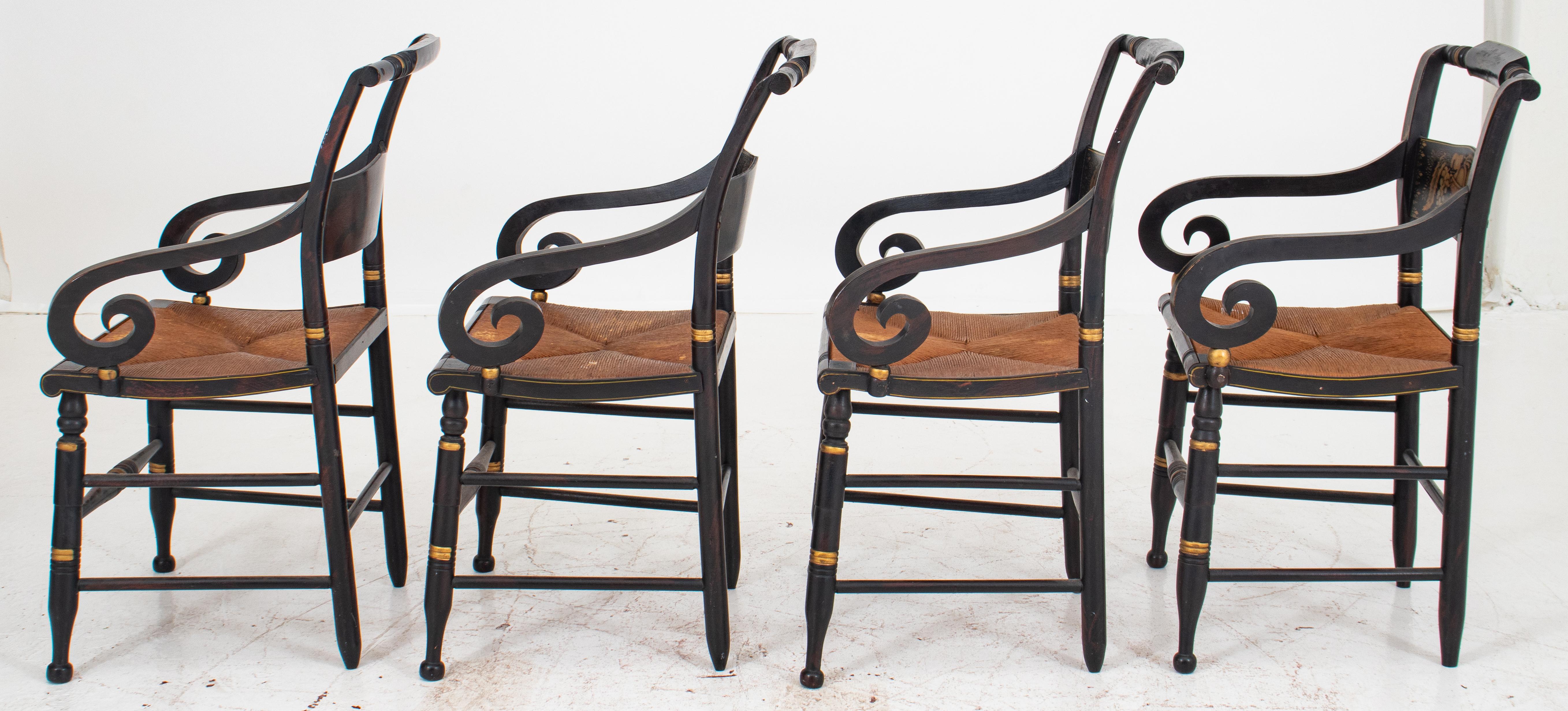 Victorian Hitchcock stenciled, faux-painted, and ebonized armchairs with rush seats, four, each with painted crestrails, scrolling arms and turned legs joined by stretchers. 34