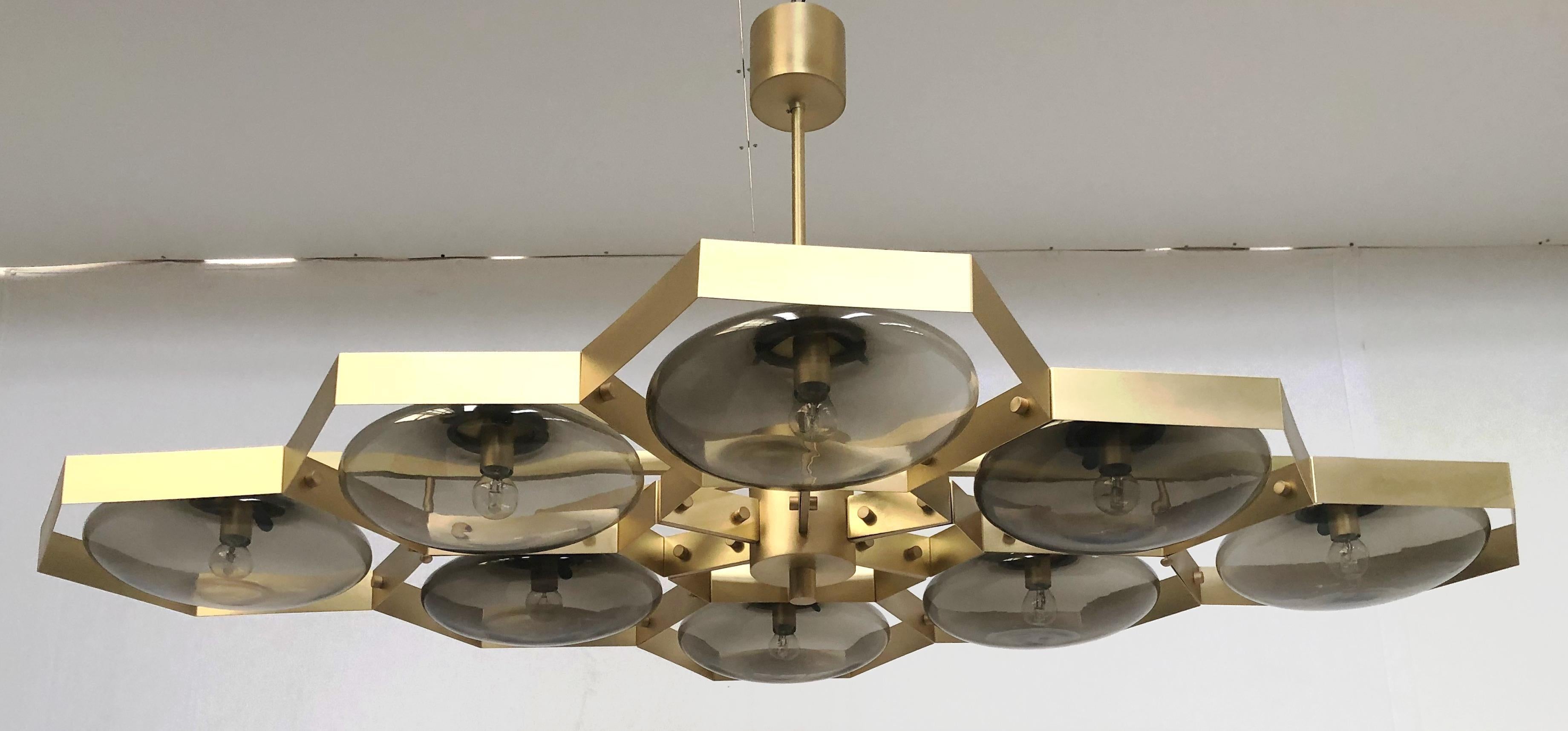 Italian chandelier with Murano glass shades mounted on solid brass frame / Made in Italy
Designed by Fabio Ltd, inspired by Angelo Lelli and Arredoluce styles
8 lights / E12 or E14 type / max 40W each
Length: 65 inches / Width: 42.5 inches / Height: