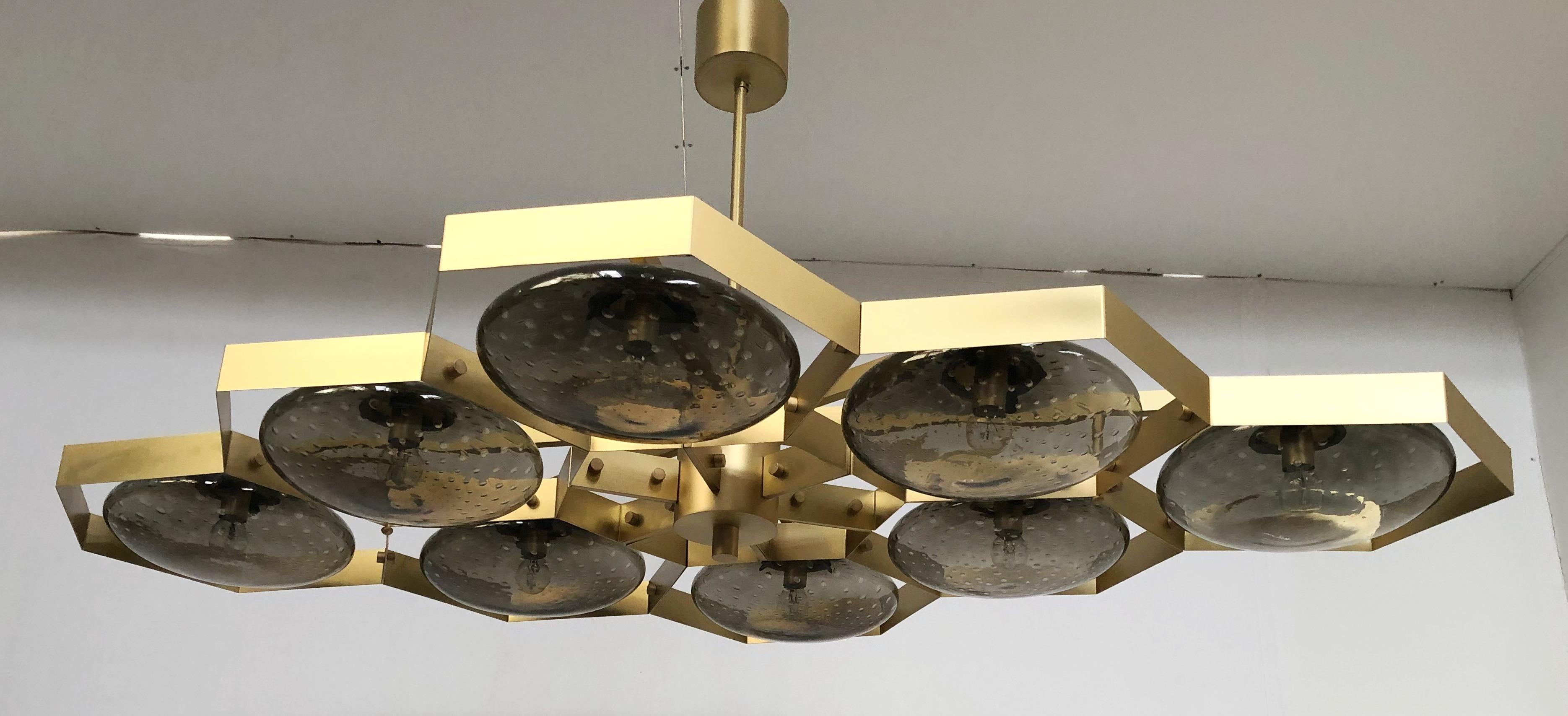 Italian chandelier with Murano glass shades mounted on solid brass frame / Made in Italy
Designed by Fabio Ltd, inspired by Angelo Lelli and Arredoluce styles
8 lights / E12 or E14 type / max 40W each
Length: 65 inches / Width: 42.5 inches / Height: