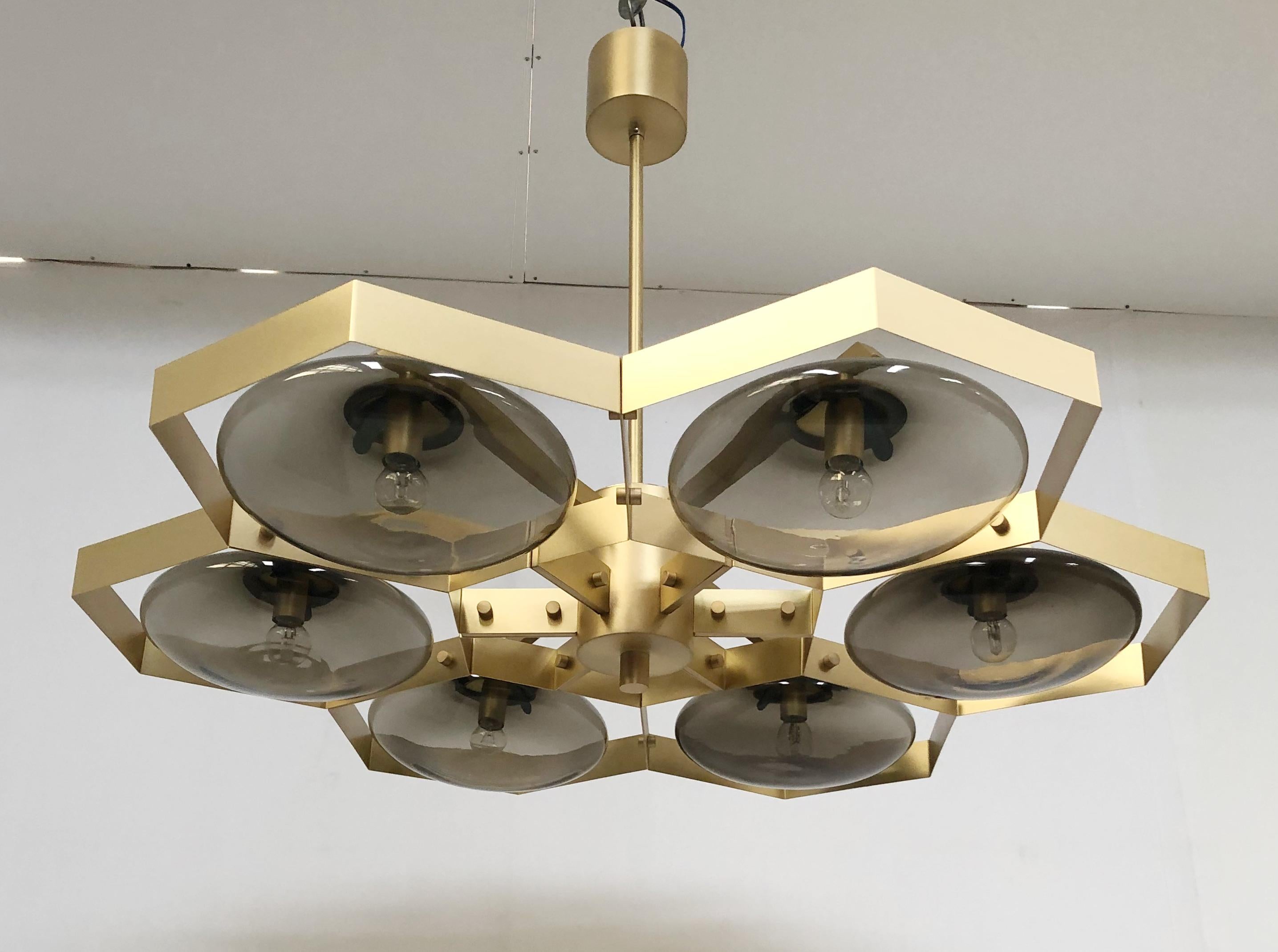 Italian chandelier with Murano glass shades mounted on solid brass frame / Made in Italy
Designed by Fabio Ltd, inspired by Angelo Lelli and Arredoluce styles
6 lights / E12 or E14 / max 40W each
Measures: Diameter 43 inches, height 30 inches
Order