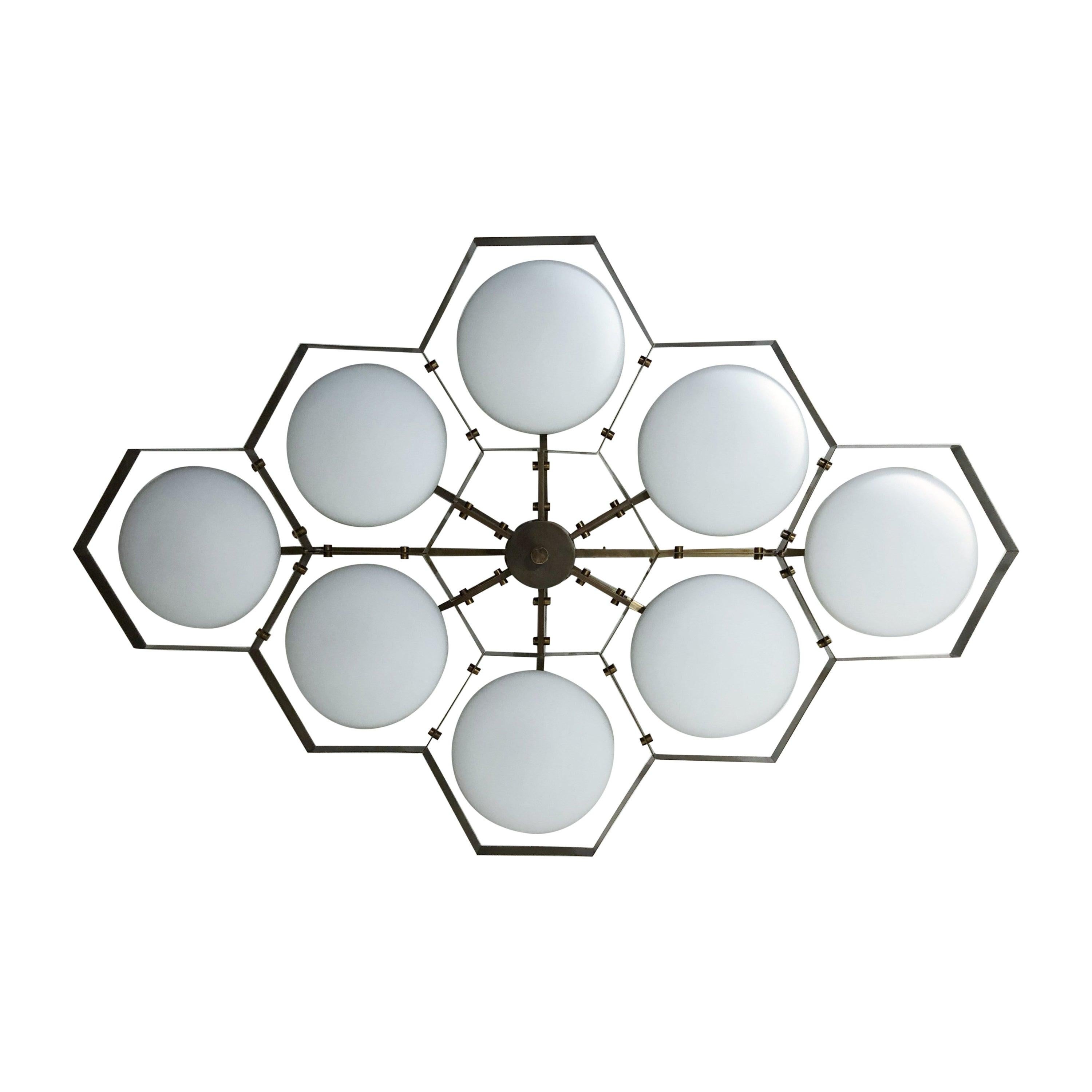 Italian flush mount with Murano glass shades mounted on solid brass frame / Made in Italy
Designed by Fabio Ltd, inspired by Angelo Lelli and Arredoluce styles
8 lights / E12 or E14 / max 40W each
Measures: Length 65 inches, width 42.5 inches,