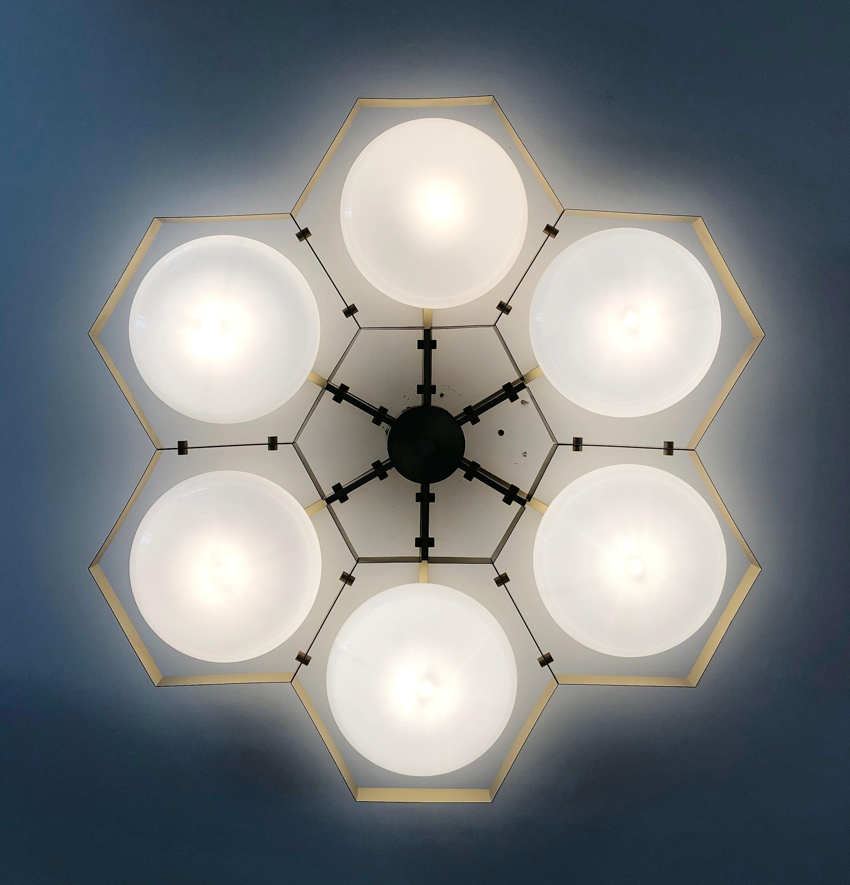 Italian flush mount with Murano glass shades mounted on solid brass frame / Made in Italy
Designed by Fabio Ltd, inspired by Angelo Lelli and Arredoluce styles
6 lights / E12 or E14 / max 40W each
Measures: Diameter 43 inches / height 10