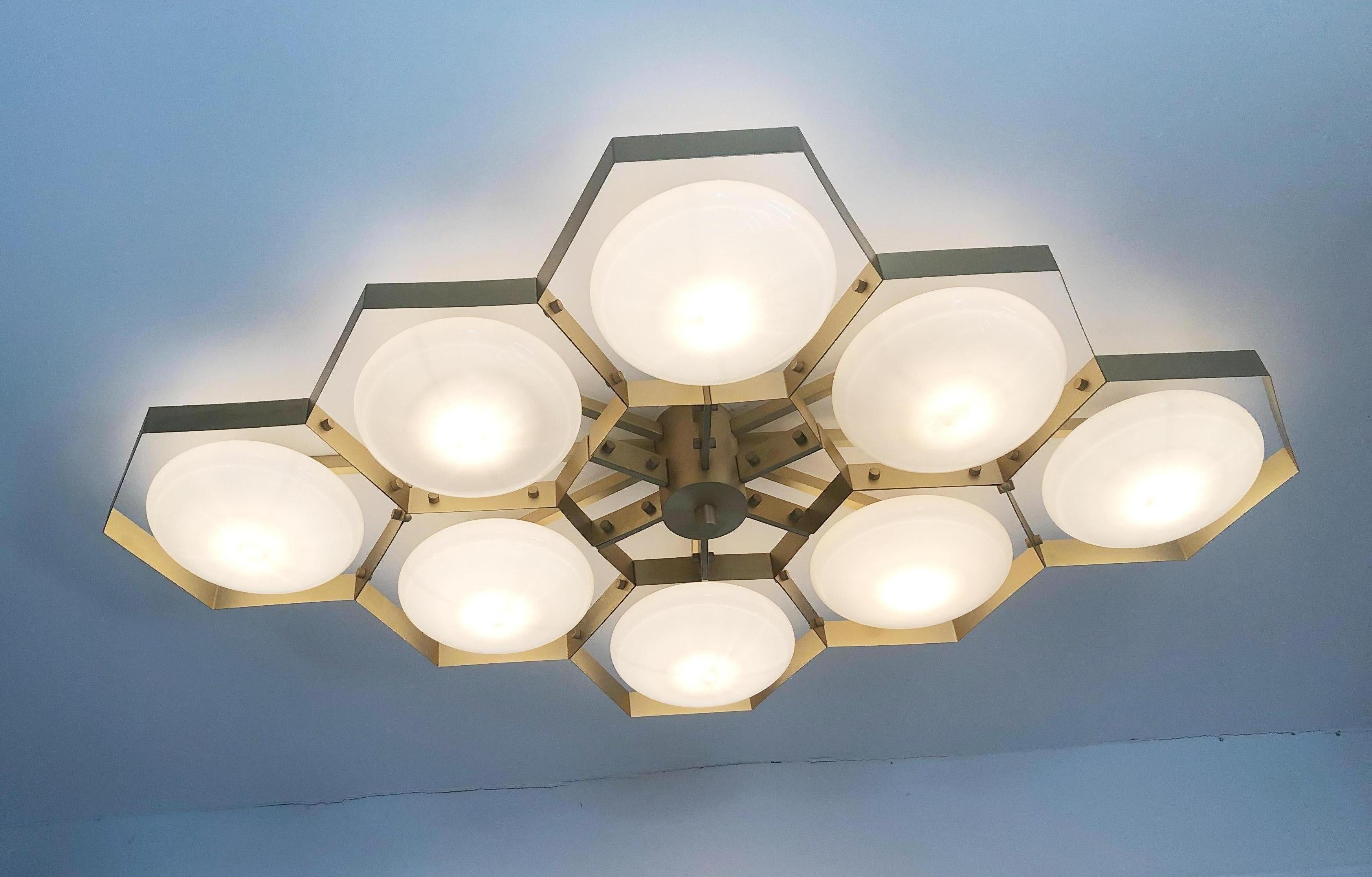 Italian flush mount with Murano glass shades mounted on solid brass frame / Made in Italy
Designed by Fabio Ltd, inspired by Angelo Lelli and Arredoluce styles
8 lights / E12 or E14 / max 40W each
Measures: Length 65 inches, width 42.5 inches,