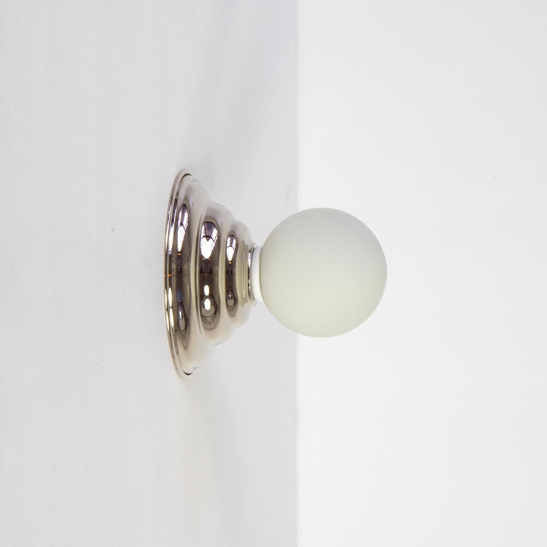 This listing is for 1x Hive Sconce in polished nickel designed and manufactured by Research.Lighting.

Materials: Brass, Steel & Glass
Finish: Polished Nickel
Electronics: 1x G9 Socket, 1x 4.5 Watt LED Bulb (included), 450 Lumens
UL Listed. Made in