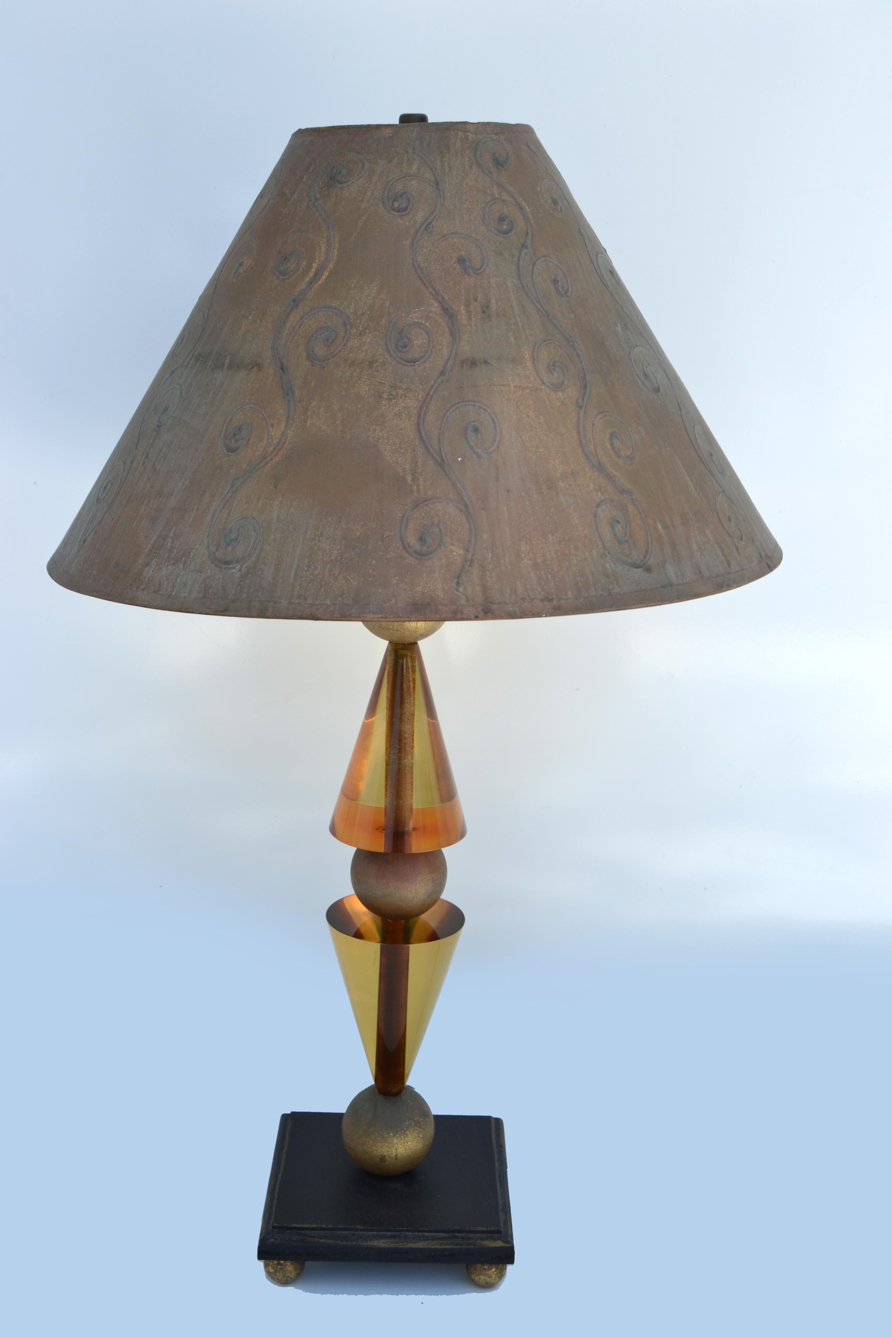 Van teal table lamp Mid-Century Modern geometric Lucite Cones and gilded round wood balls with the original shade on wooden base. 
In working condition, UL listed and takes a regular or LED light bulb.
Base measures 6 x 6 inches square.
Height to