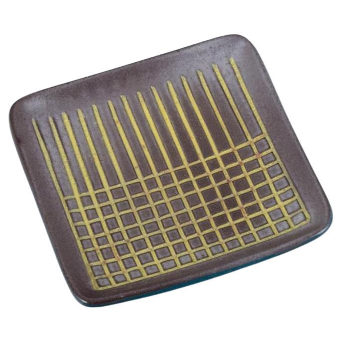 Hjördis Oldfors for Upsala Ekeby. Ceramic tray in yellow, brown, and blue tones For Sale