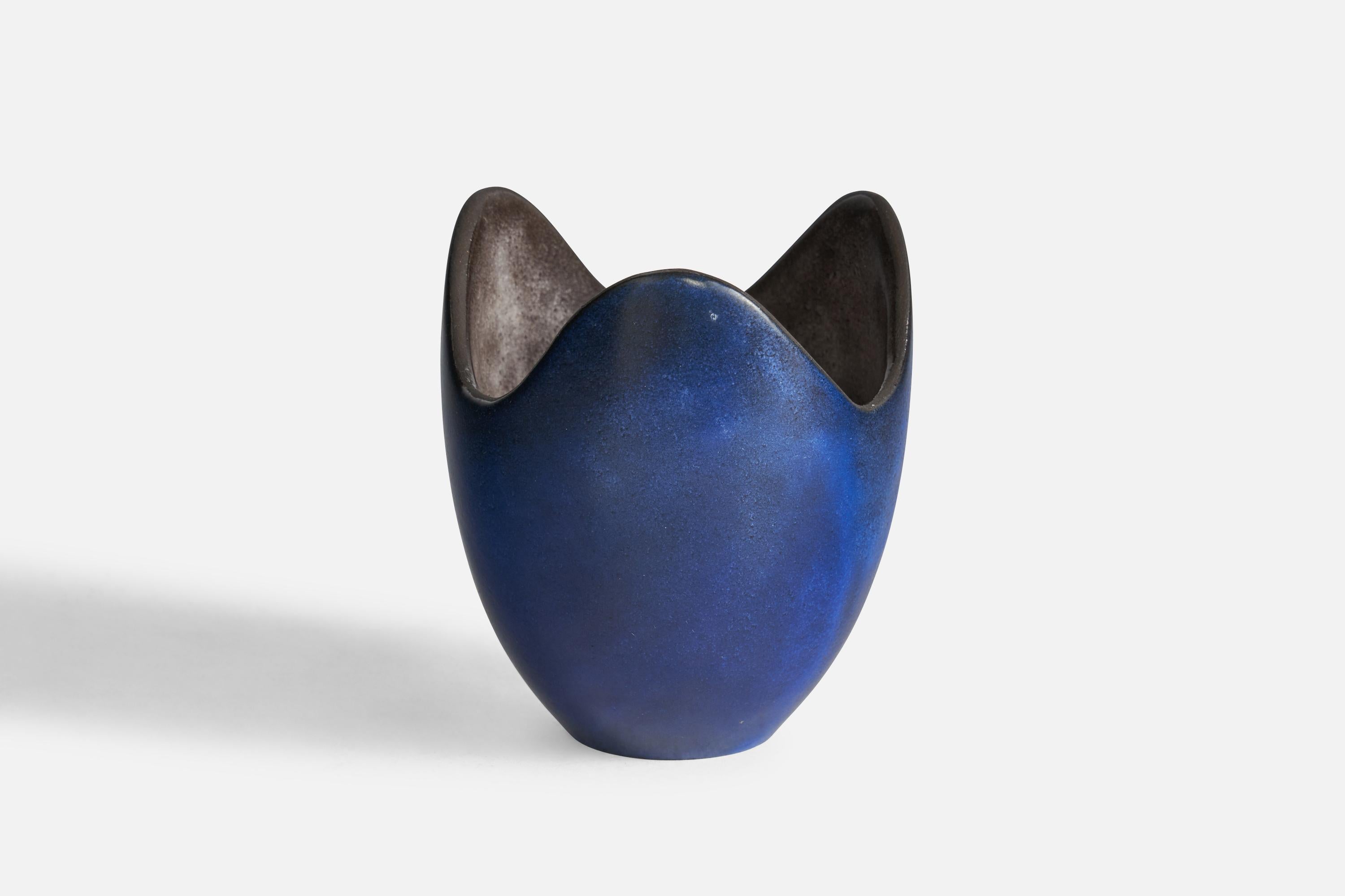 A blue-glazed freeform vase designed by Hjördis Oldfors and produced by Upsala Ekeby, Sweden, 1950s.