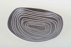 Hjördis Oldfors, Upsala-Ekeby. Asymmetrical ceramic bowl with linear decoration.