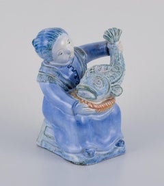 Hjorth, Bornholm, Denmark, fisherwoman figurine in glazed ceramic. Mid-20th C.