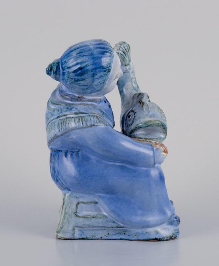 20th Century Hjorth, Bornholm, Denmark, fisherwoman figurine in glazed ceramic. Mid-20th C. For Sale