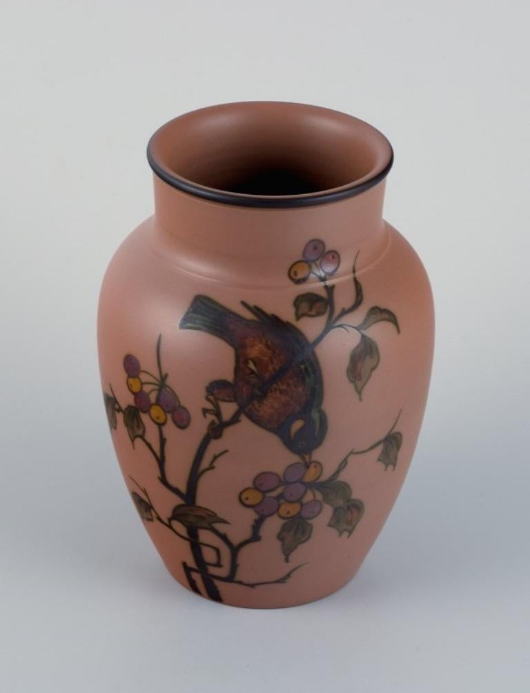 Danish Hjorth Bornholm, Denmark. Handmade ceramic vase decorated with a bird