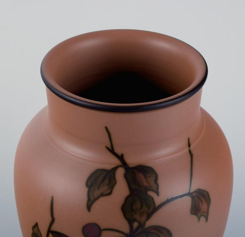 Glazed Hjorth Bornholm, Denmark. Handmade ceramic vase decorated with a bird