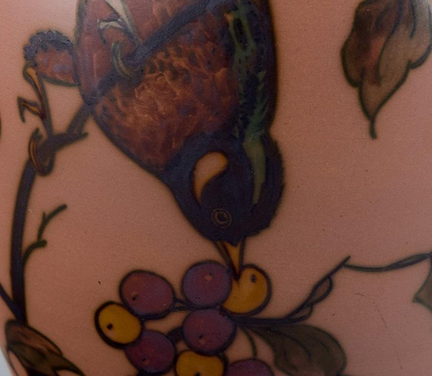 20th Century Hjorth Bornholm, Denmark. Handmade ceramic vase decorated with a bird