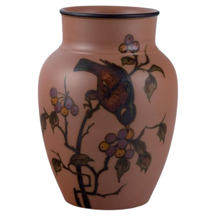 Hjorth Bornholm, Denmark. Handmade ceramic vase decorated with a bird