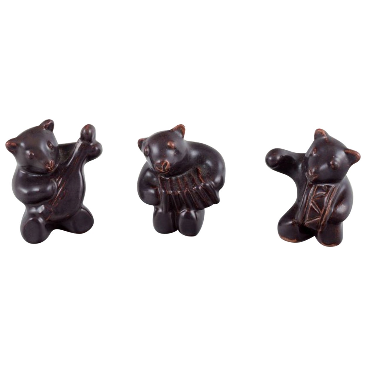 Hjorth, Bornholm. Three bear musicians in stoneware. Brown glaze.
