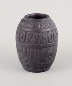 Hjorth, Bornholm. Two beautiful vases and a bowl in black terracotta.