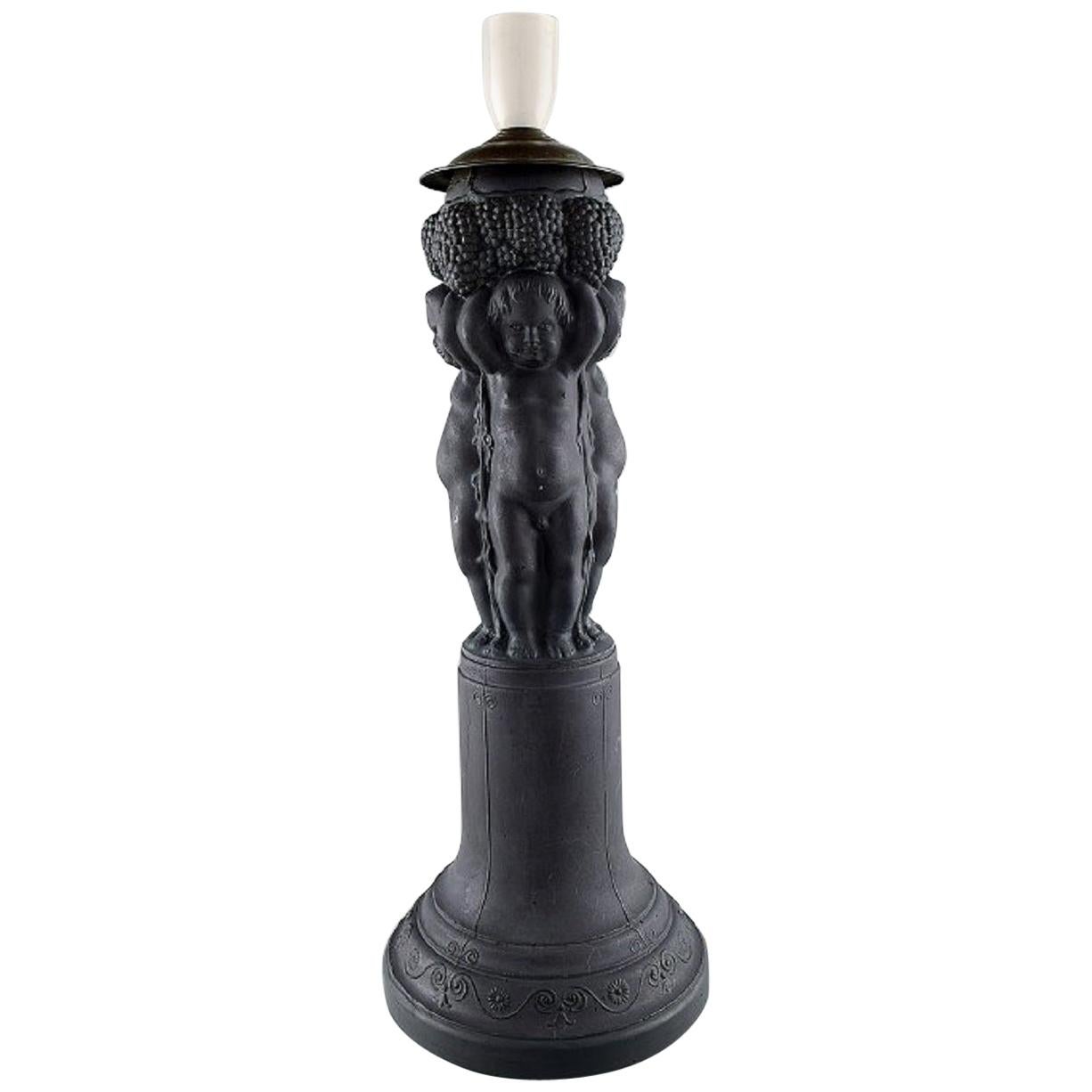 Hjorth, Denmark, Large Lamp Made of Black Terracotta Decorated with Putti For Sale