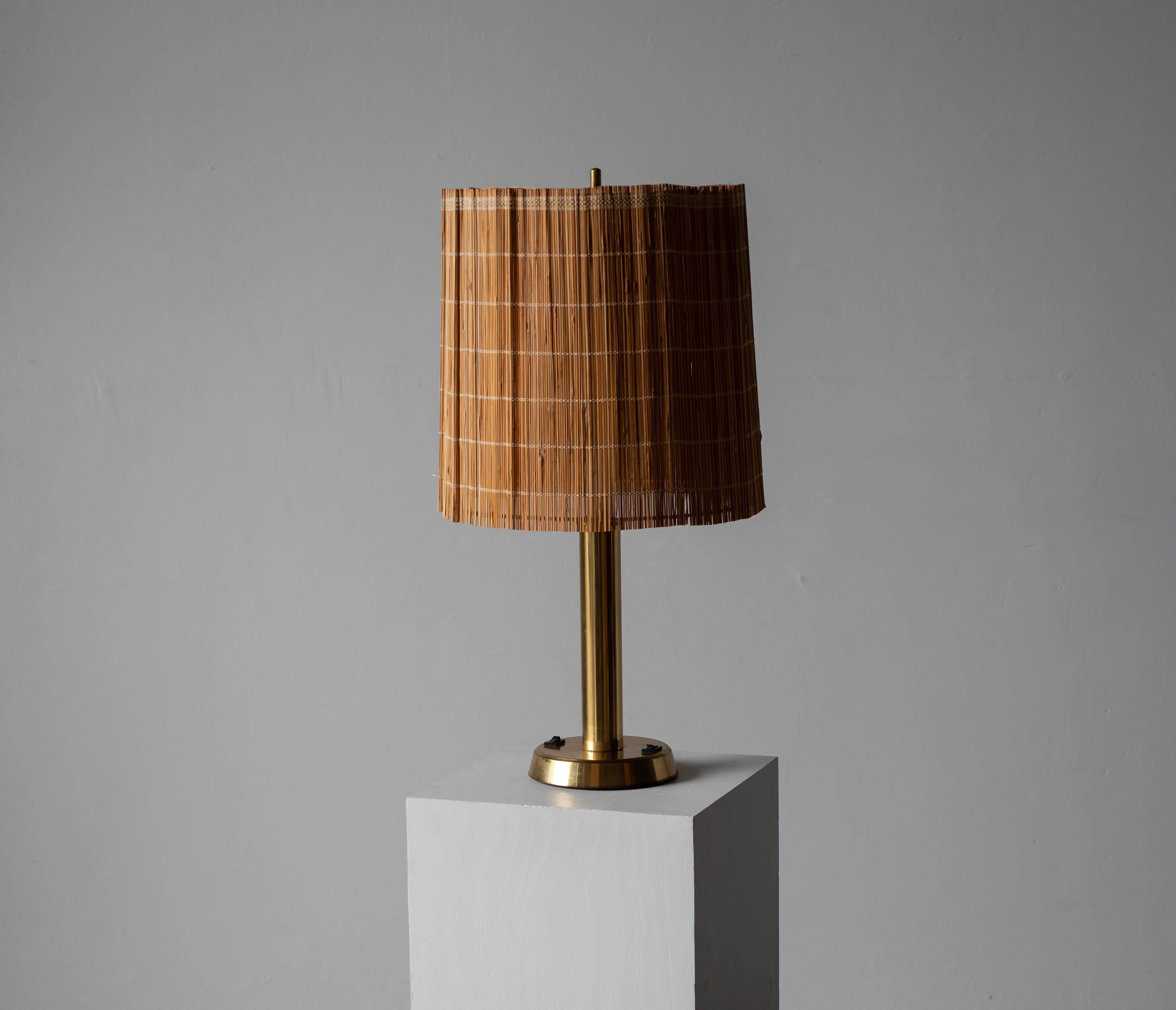 A sizeable brass and reed table lamp, produced by HK Aro, Finland, 1960s.