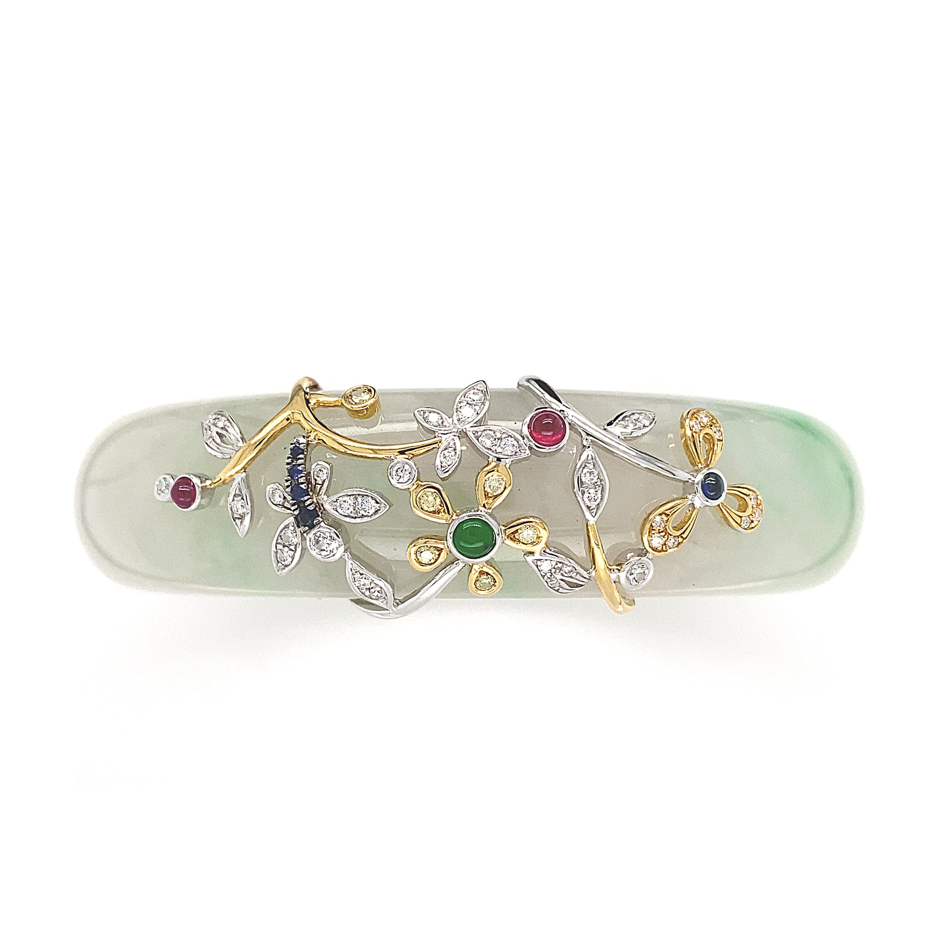 The House of Dilys’ presents – the Jade 'Botanica' Bangle. To highlight the icy lustre and veins of green, characteristic to this natural jade piece that weighs 329.77cts, the bangle is adorned with an enchanting flower garland in 18K White Gold and