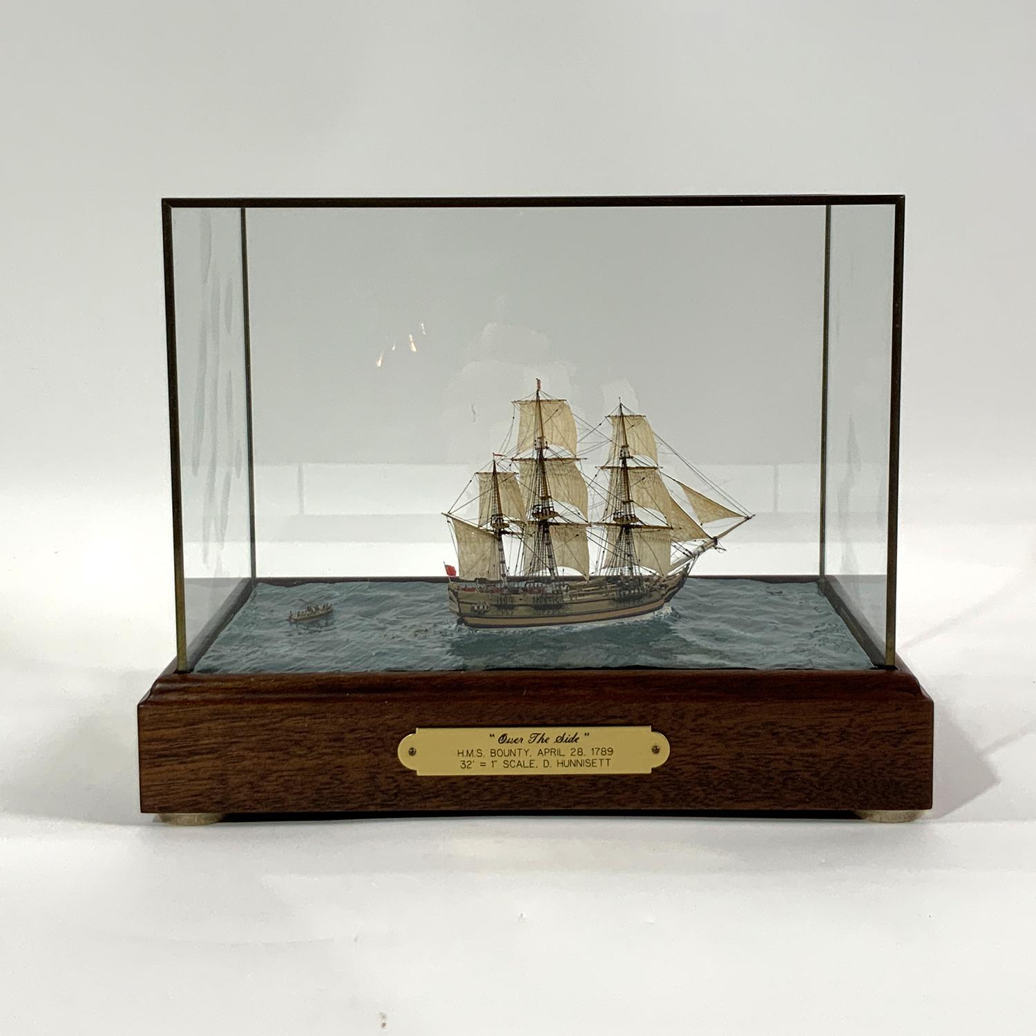 Extreme miniature ship model with engraved title plate that reads:
