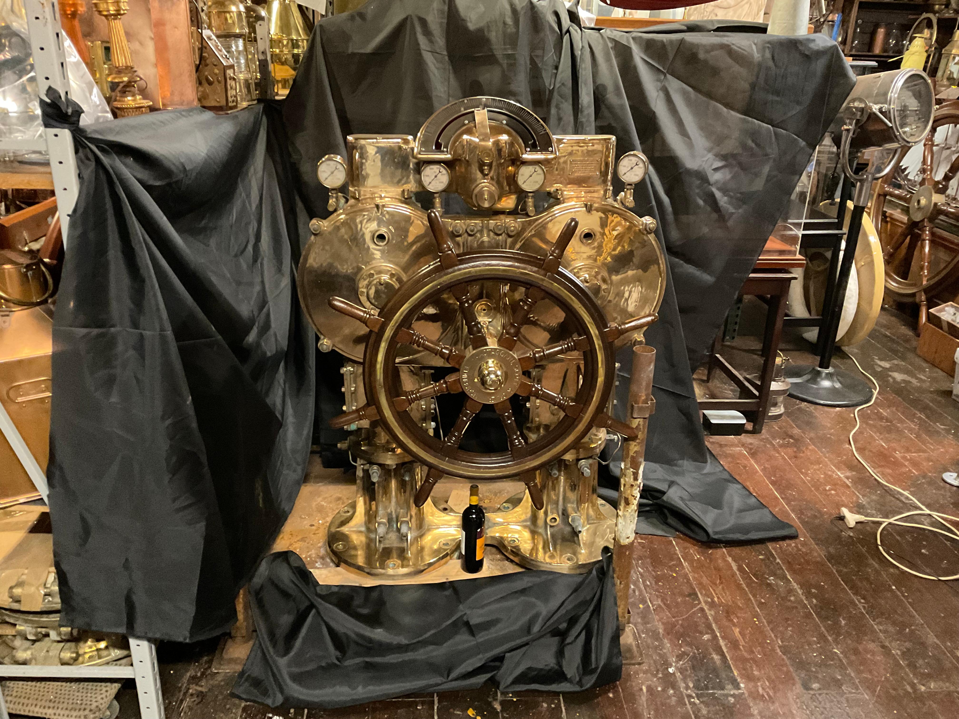 Massive 1400-pound glimmering brass emergency auxiliary steering station from the British Royal Navy Aircraft Carrier HMS Invincible. It is immense, it is spectacular and amazing. With accessory gauges, gears, tubes, brackets, rudder indicator, etc.