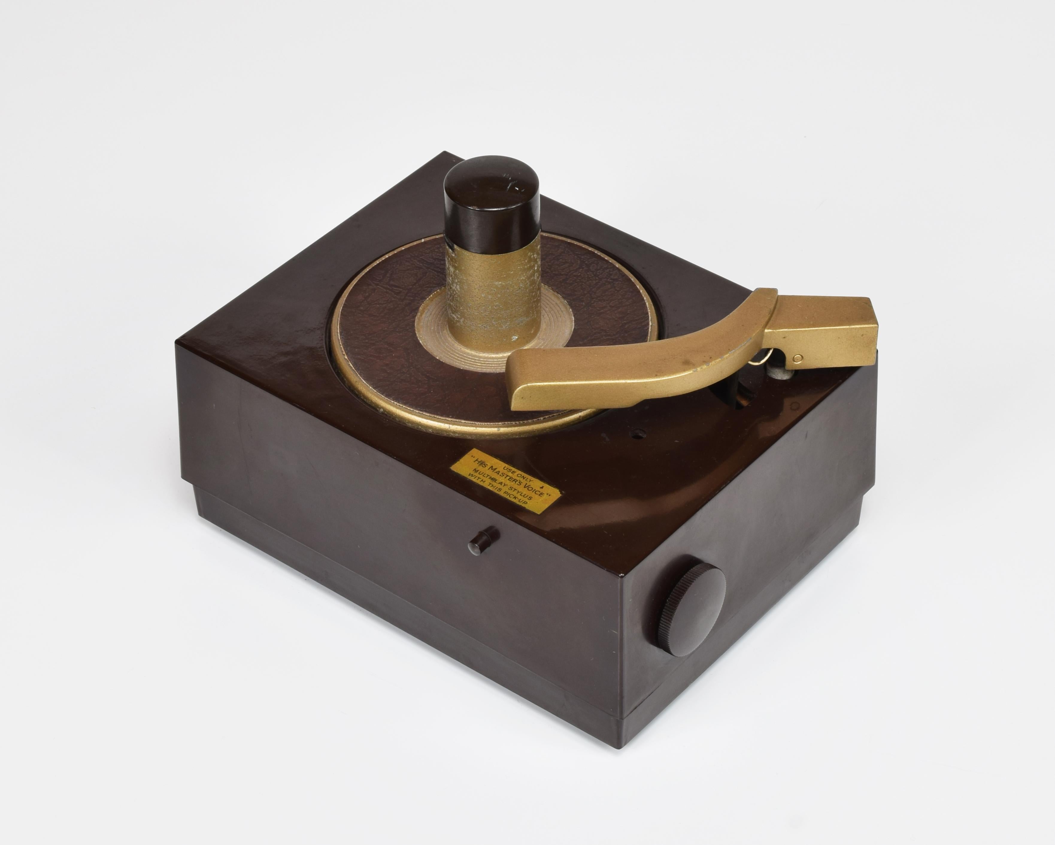His Masters Voice (HMV), UK (manufacturer)
Model 2107A (RCA 45-J equivalent) 45rpm record player with record-changer facility
Manufactured under licence from RCA Victor
Designed 1949, manufactured c.1949-51
Bakelite case. Ceramic cartridge. Some