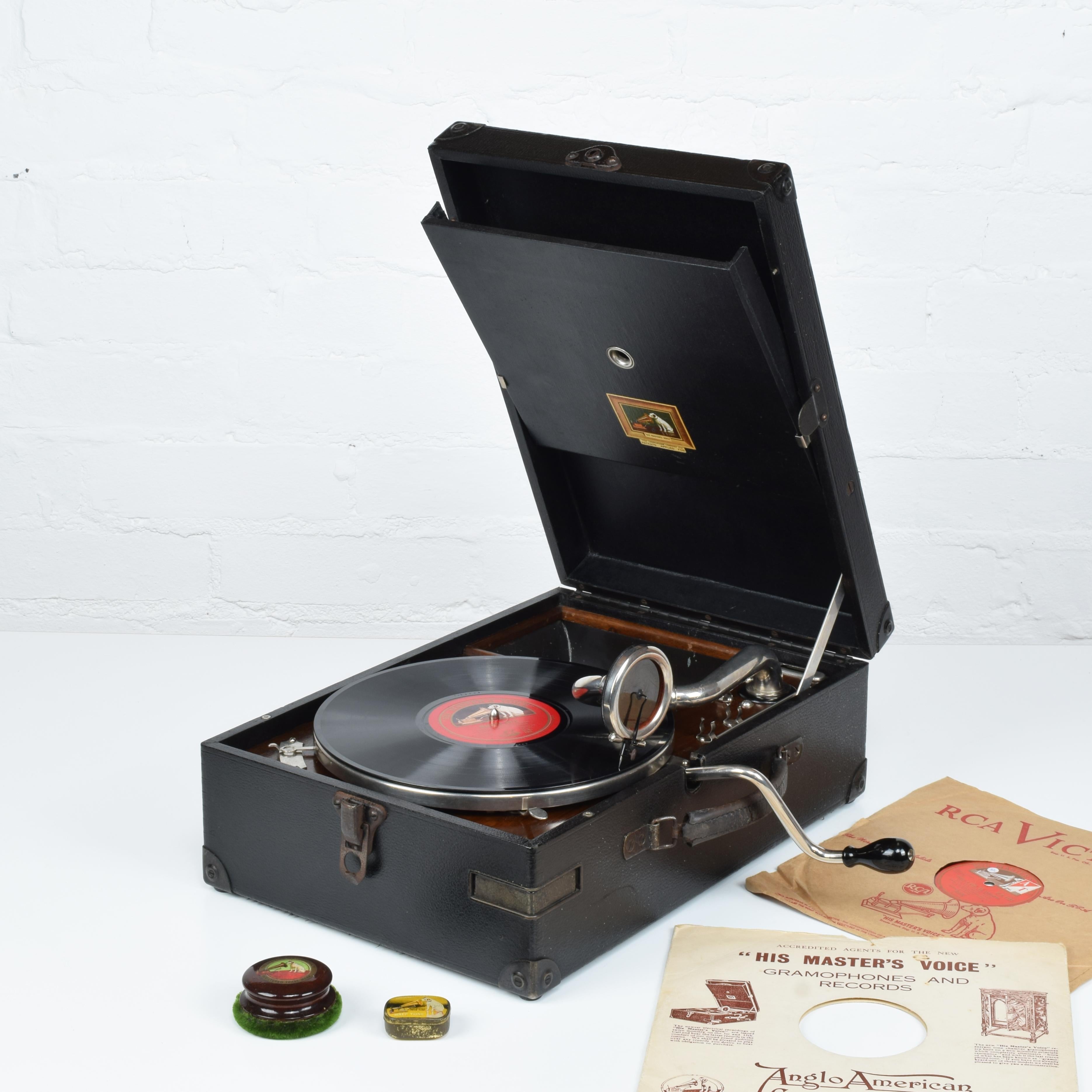 HMV 'Standard Portable' Model 101 gramophone with No.4 soundbox, circa 1925.
Manufacturer: His Master's Voice, UK

Black Rexine leather-cloth, polished wood and chrome finished interior and fittings. Original turntable felt.
Super original