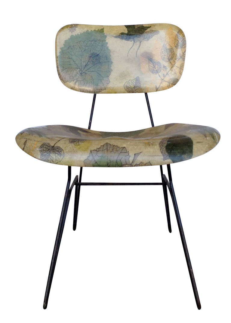 Constructed by Chemold Manufacturing, Hobart Wells designed this Hairpin side chair for the Lensol-Wells Company. This chair features a seat and back made of molded fiberglass and fabric, by Glenn of California Fabric, embedded in the plastic seat