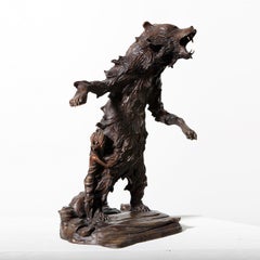 Her Bear by Hobbes Vincent. Bronze sculpture of a bear protecting a little girl
