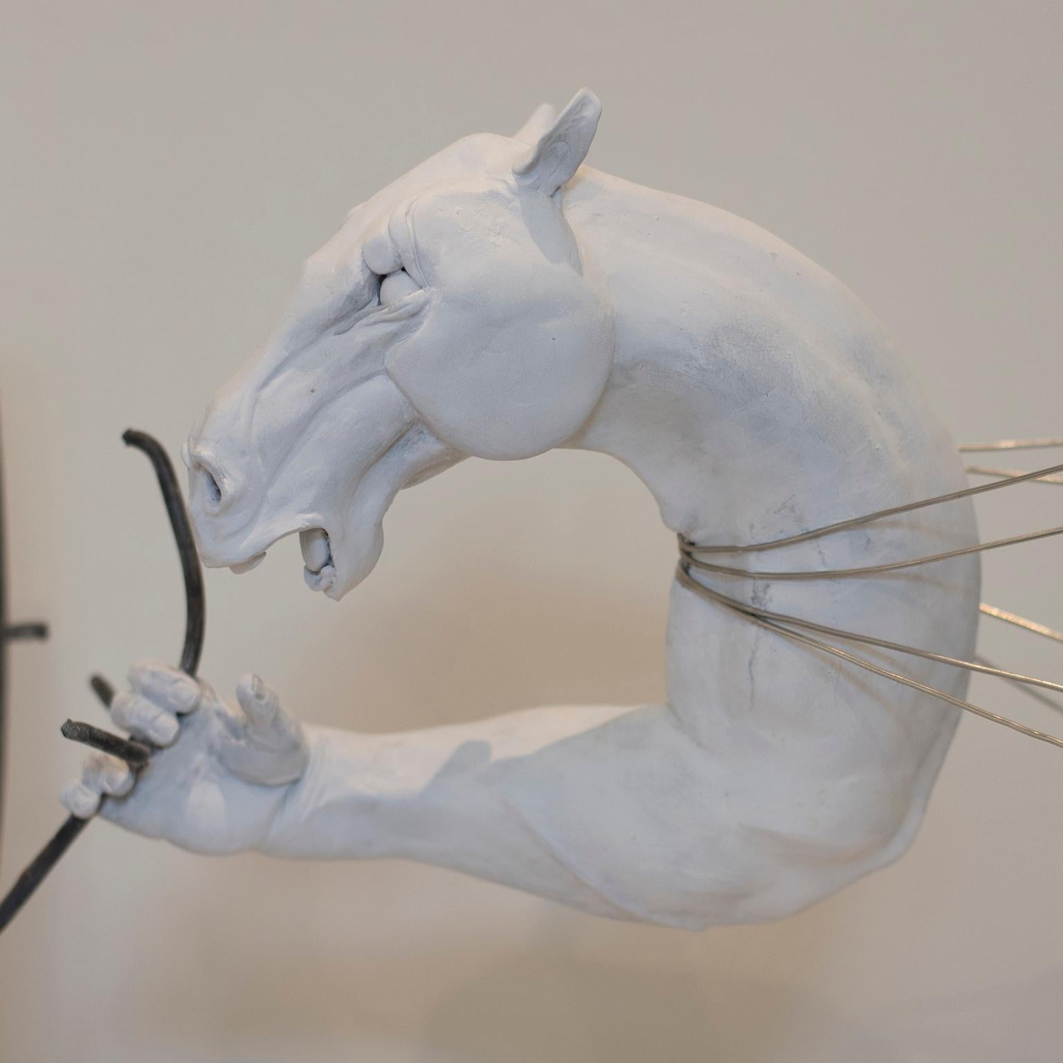 Time by Hobbes Vincent is an original steel and white epoxy plaster sculpture. 
11.5 x 18.5 x 11.5 in

This surrealism sculpture often invokes the though to raw horse power. 

Hobbes first began sculpting as a small child, making his own toys out of