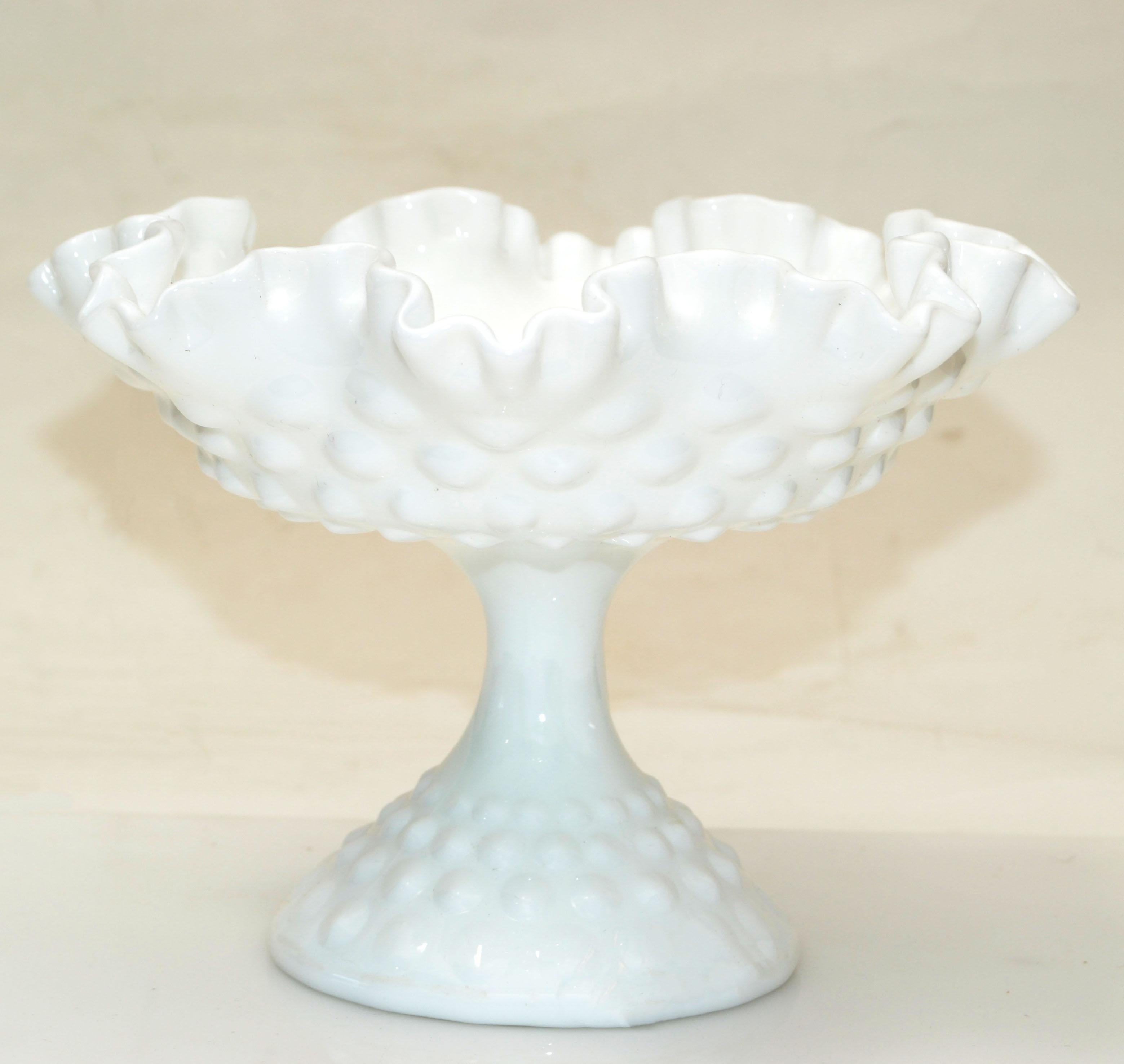 Fenton Art Glass style hobnail white ruffled milk glass footed bowl, candy dish or whip cream serving bowl from the 1970. 
Great craftsmanship with elegance.
Simply beautiful.